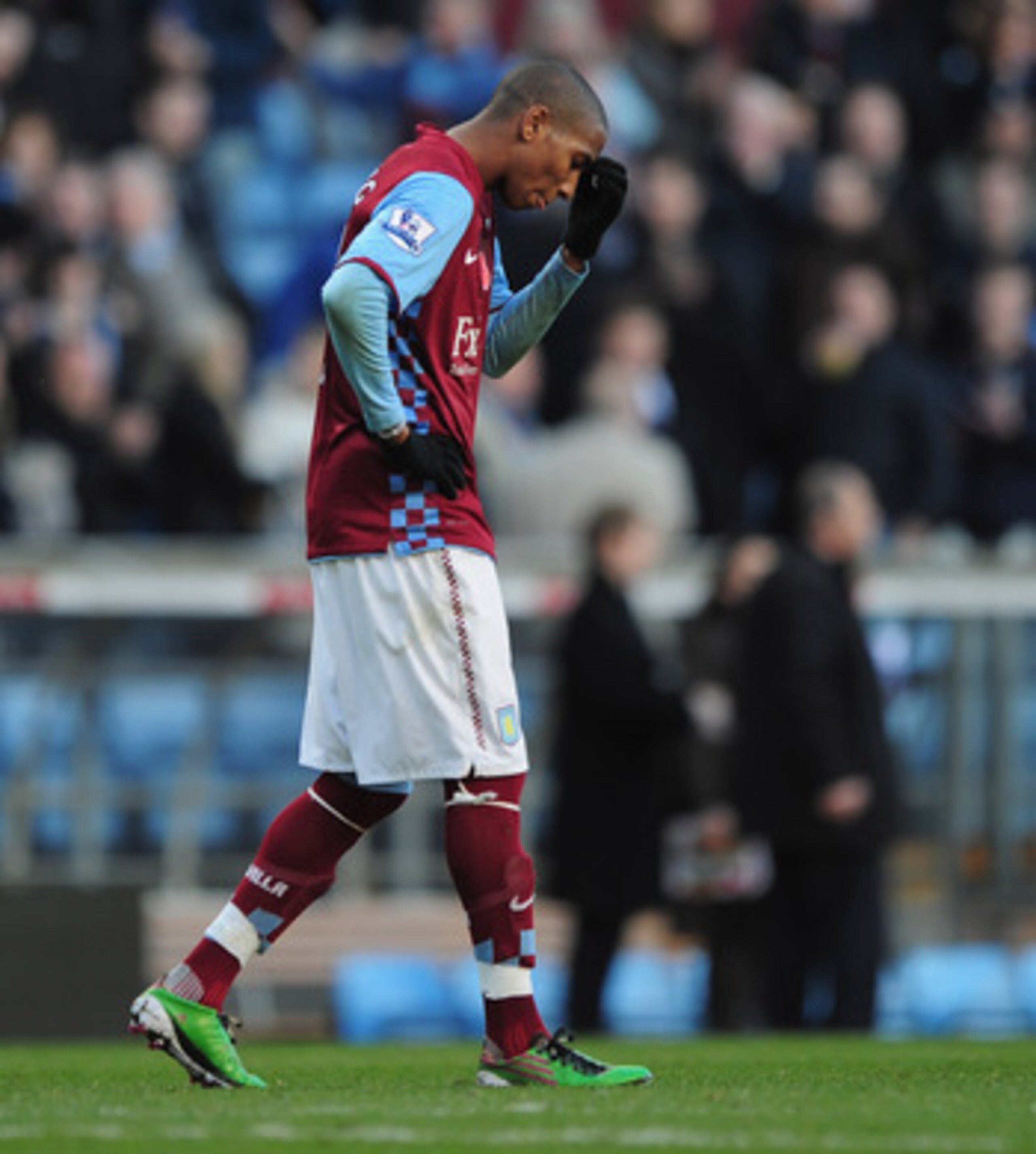 BIRMINGHAM, ENGLAND - NOVEMBER 13:  Ashley Young of Aston Villa is dejected at the end of the Barclays Premier League match between Aston Villa and Manchester United at Villa Park on November 13, 2010 in Birmingham, England.  (Photo by Shaun Botterill/Get