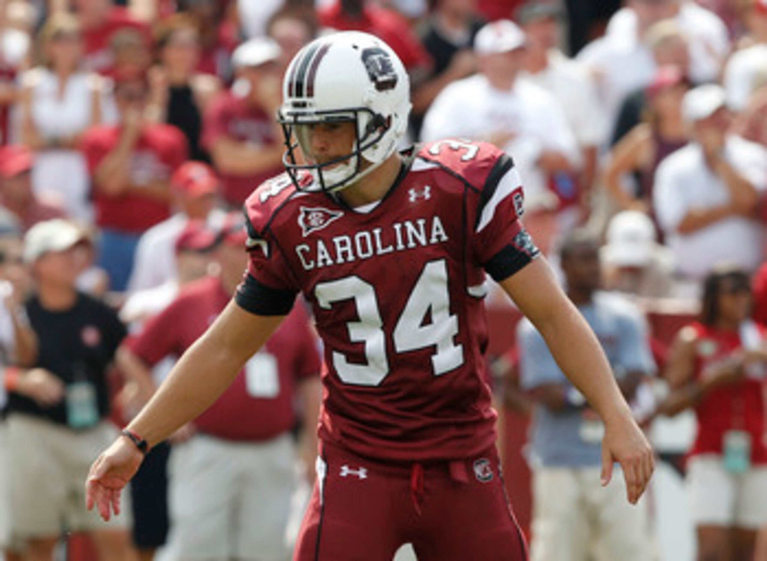 COLUMBIA, SC - SEPTEMBER 11:  Kicker Spencer Lanning #34 of the South Carolina Gamecocks walks back to the bench after kicking a field goal during the game against the Georgia Bulldogs at Williams-Brice Stadium on September 11, 2010 in Columbia, South Car