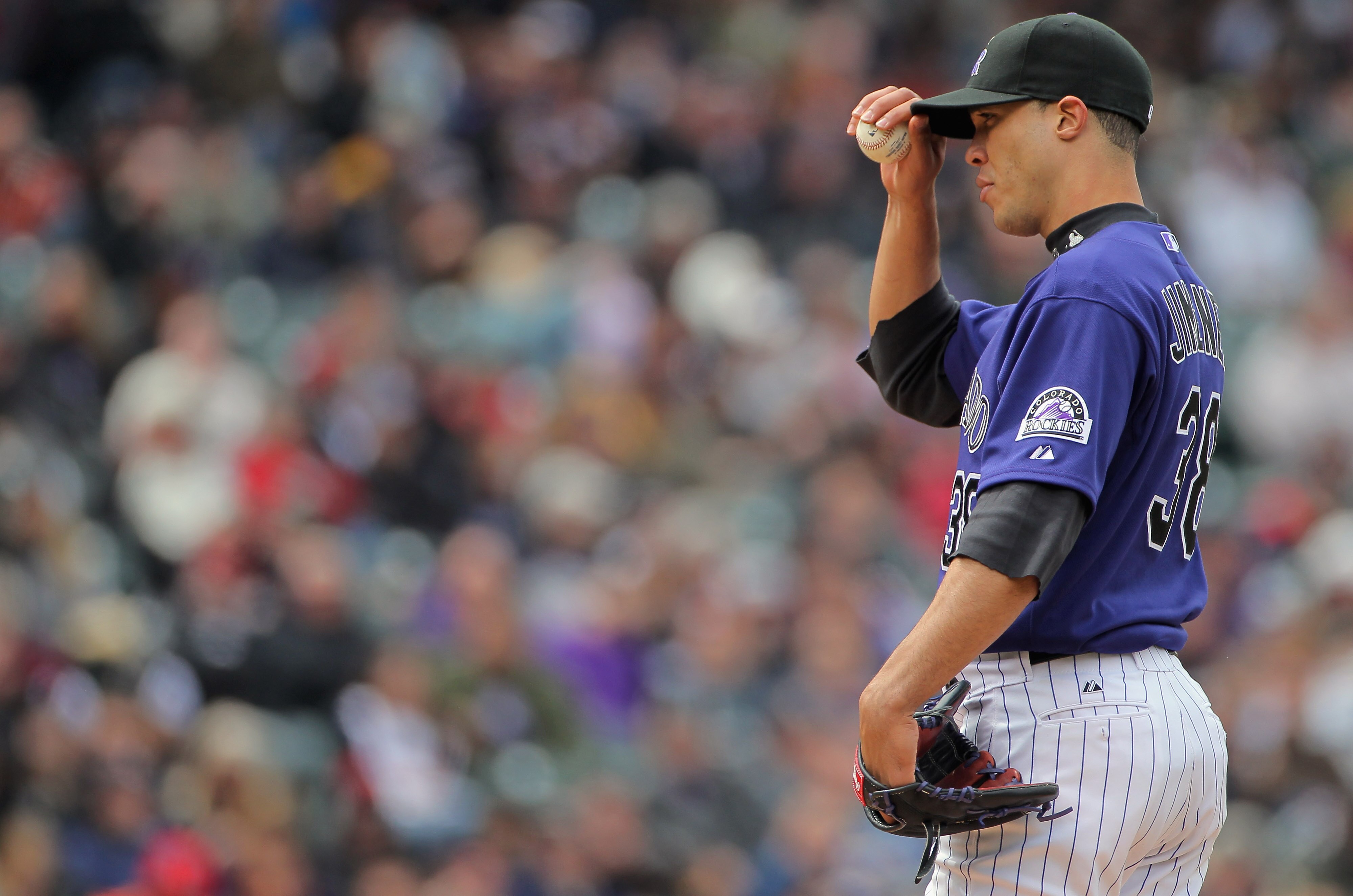 DENVER, CO - MAY 01:  Starting pitcher Ubaldo Jimenez #38 of the Colorado Rockies works against the Pittsburgh Pirates at Coors Field on May 1, 2011 in Denver, Colorado. Jimenez collected the loss as the Pirates defeated the Rockies 8-4.  (Photo by Doug P