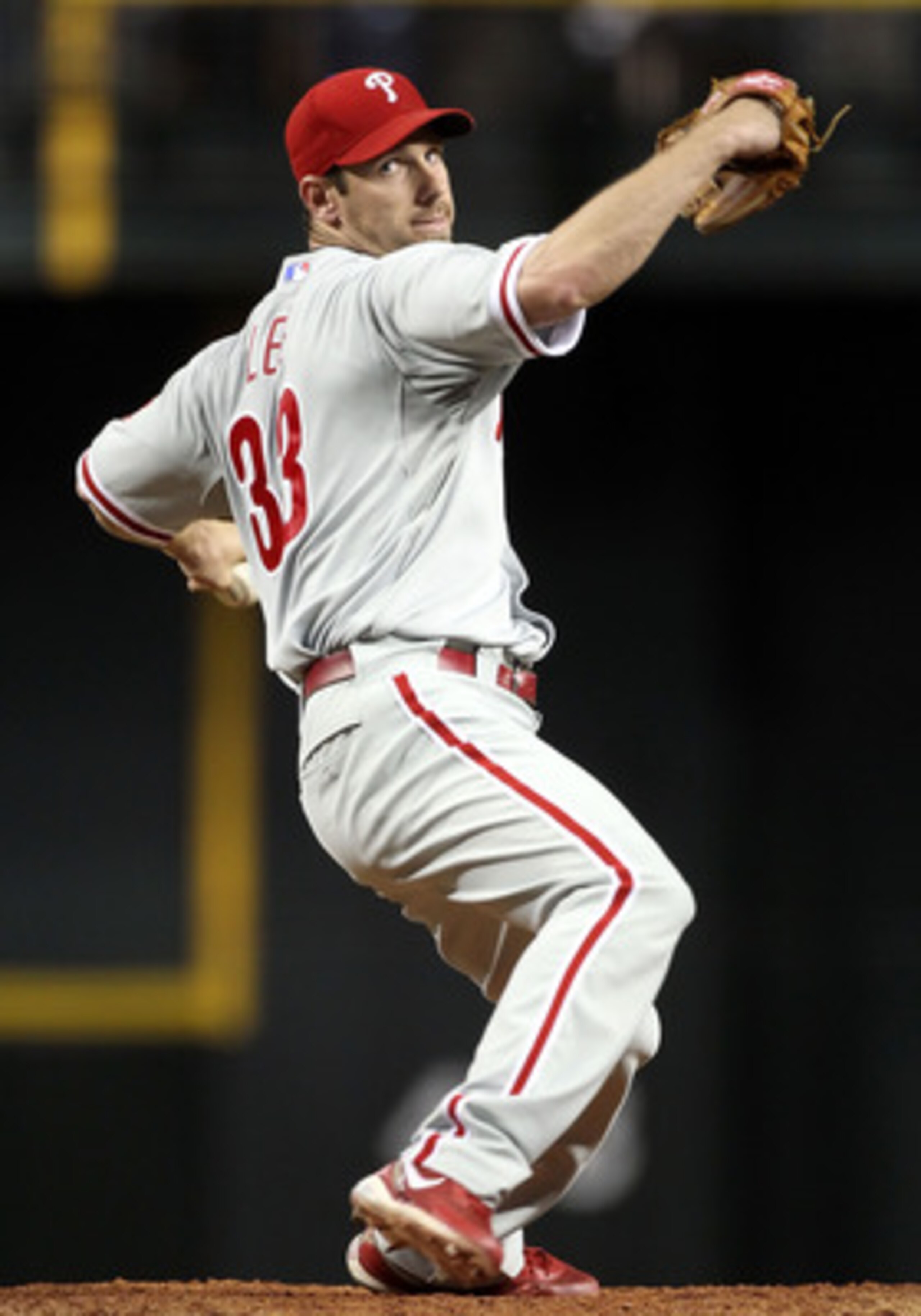 PHOENIX, AZ - APRIL 25: Starting pitcher Cliff Lee #33 of the Philadelphia Phillies pitches against the Arizona Diamondbacks during the Major League Baseball game at Chase Field on April 25, 2011 in Phoenix, Arizona. The Diamondbacks defeated the Philli PHOENIX, AZ - APRIL 25: Starting pitcher Cliff Lee #33 of the Philadelphia Phillies pitches against the Arizona Diamondbacks during the Major League Baseball game at Chase Field on April 25, 2011 in Phoenix, Arizona. The Diamondbacks defeated the Philli