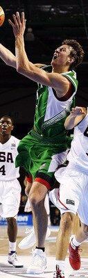 AUCKLAND, NEW ZEALAND - JULY 08: Donatas Motiejunas of Lithuania takes the ball to the hoop as Seth Curry of the United States defends during the U19 Basketball World Championships match between the United States and Lithuania at North Shore Events Centr AUCKLAND, NEW ZEALAND - JULY 08: Donatas Motiejunas of Lithuania takes the ball to the hoop as Seth Curry of the United States defends during the U19 Basketball World Championships match between the United States and Lithuania at North Shore Events Centr