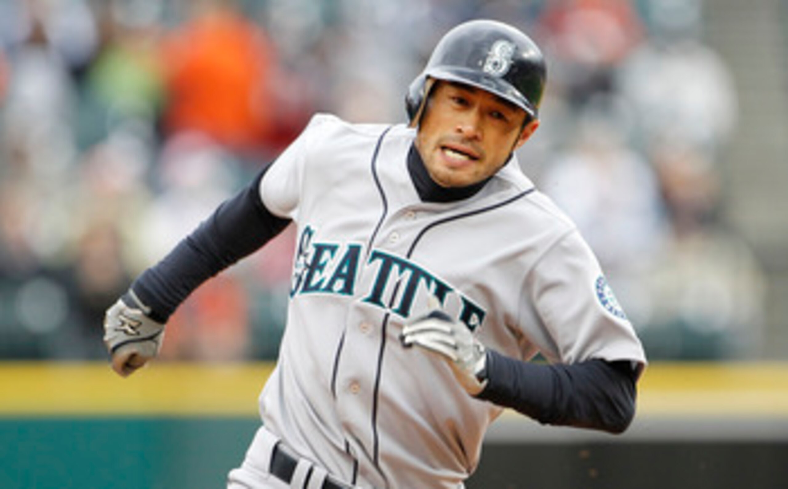 DETROIT - APRIL 28: Ichiro Suzuki #51 of the Seattle Mariners sprints to third base during the during the fifth inning of the game against the Detroit Tigers at Comerica Park on April 28, 2011 in Detroit, Michigan. The Mariners defeated the Tigers 7-2. (P