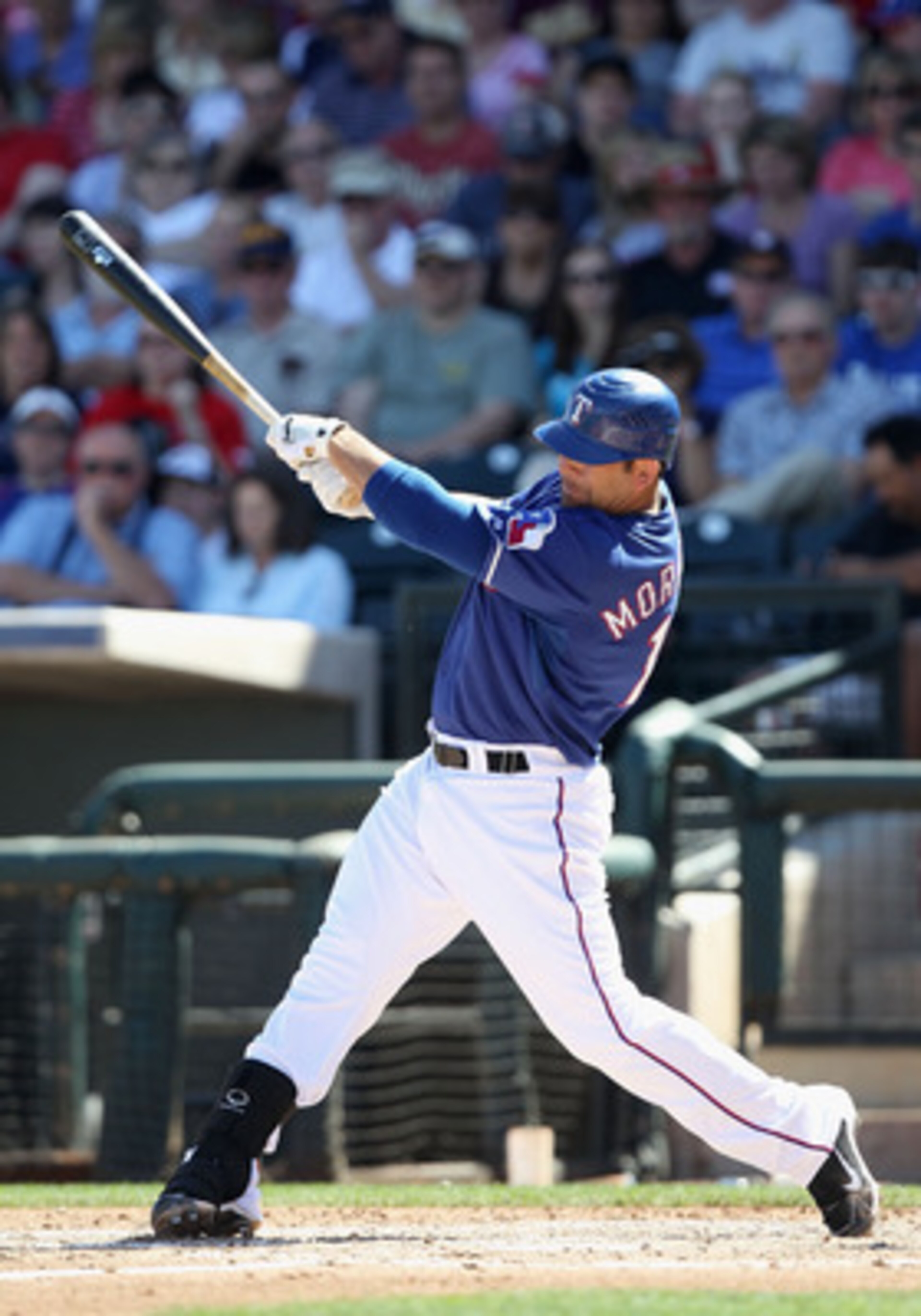 SURPRISE, AZ - MARCH 11: Mitch Moreland #18 of the Texas Rangers bats against the Cincinnati Reds during the spring training game at Surprise Stadium on March 11, 2011 in Surprise, Arizona. (Photo by Christian Petersen/Getty Images) SURPRISE, AZ - MARCH 11: Mitch Moreland #18 of the Texas Rangers bats against the Cincinnati Reds during the spring training game at Surprise Stadium on March 11, 2011 in Surprise, Arizona. (Photo by Christian Petersen/Getty Images)