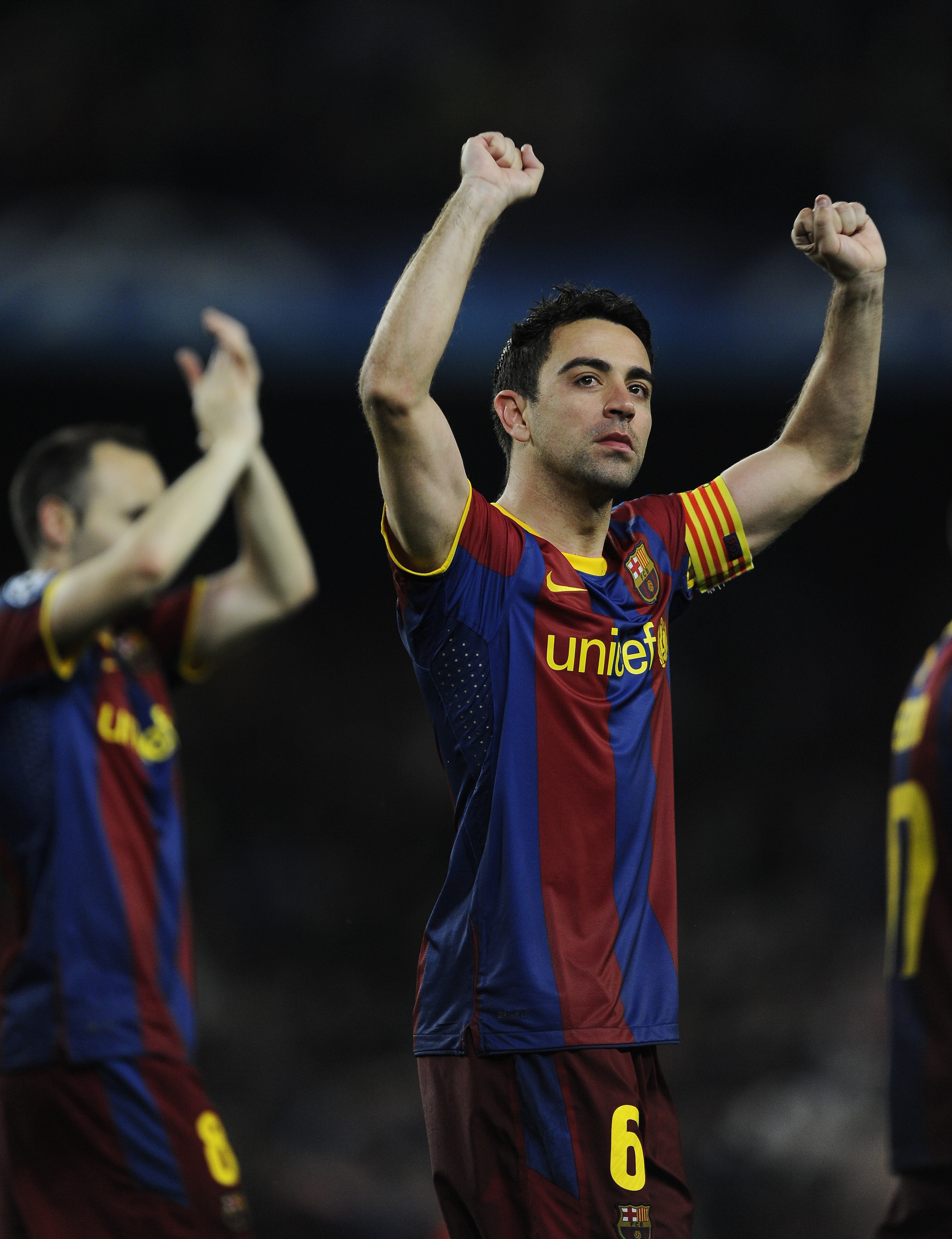 BARCELONA, SPAIN - MAY 03: Xavi Hernandez of FC Barcelona celebrates after defeating Real Madrid at the end of the UEFA Champions League Semi Final second leg match between Barcelona and Real Madrid, at the Camp Nou on May 3, 2011 in Barcelona, Spain. ( BARCELONA, SPAIN - MAY 03: Xavi Hernandez of FC Barcelona celebrates after defeating Real Madrid at the end of the UEFA Champions League Semi Final second leg match between Barcelona and Real Madrid, at the Camp Nou on May 3, 2011 in Barcelona, Spain. (