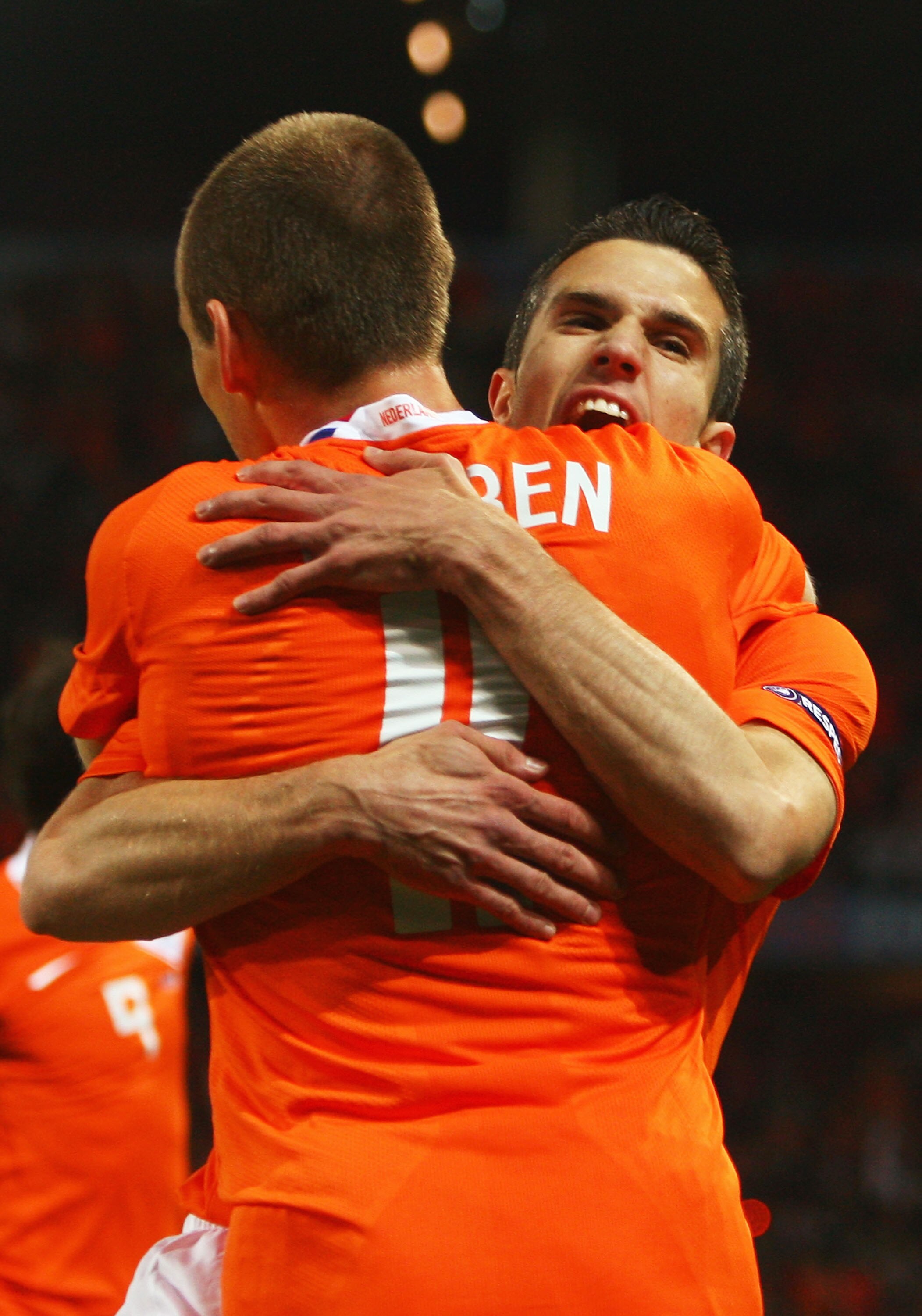BERNE, SWITZERLAND - JUNE 13:  Robin van Persie of Netherlands celebrates with Arjen Robben after scoring his team's second goal during the UEFA EURO 2008 Group C match between Netherlands and France at Stade de Suisse Wankdorf on June 13, 2008 in Berne,