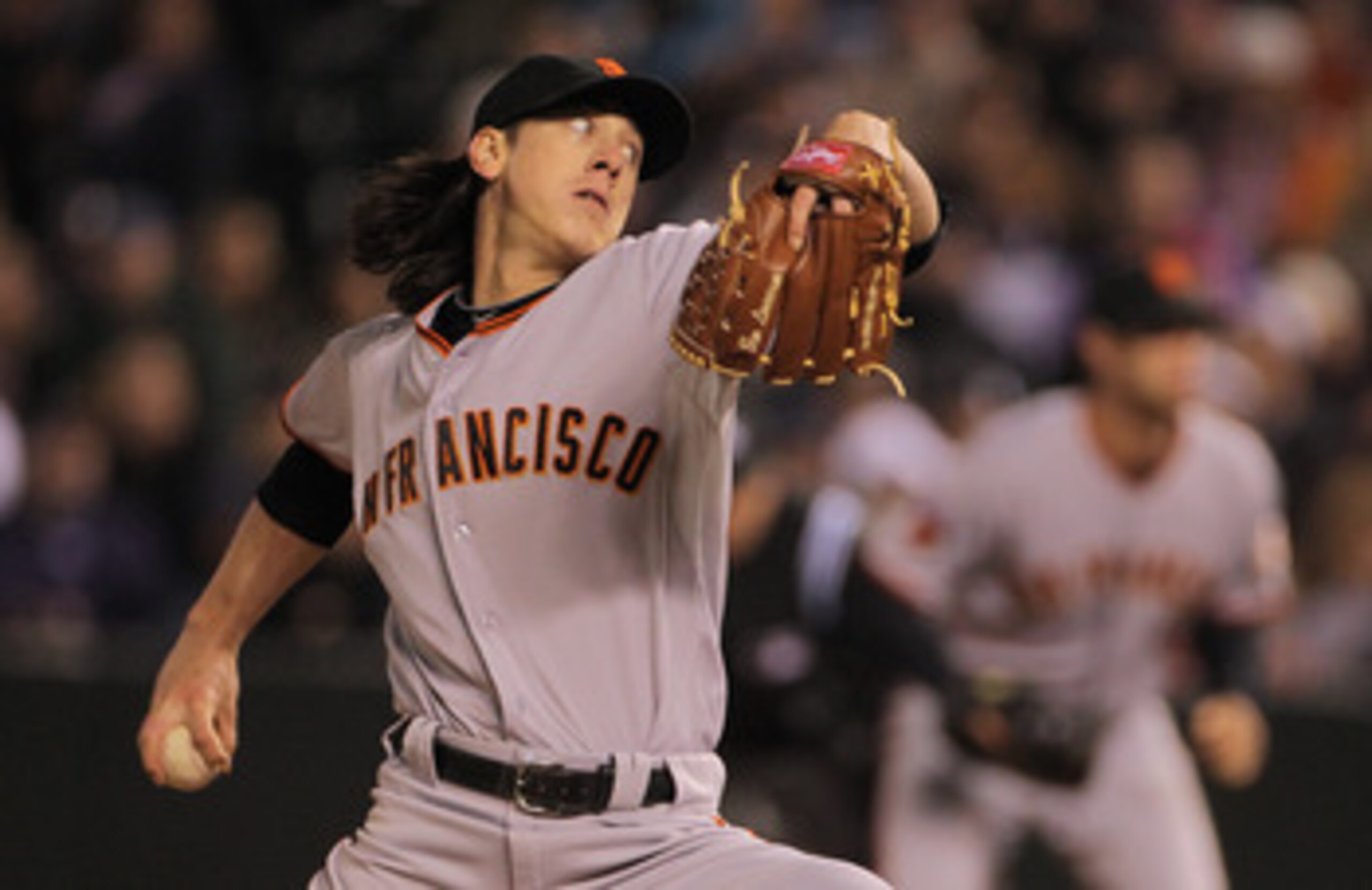 DENVER, CO - APRIL 18:  Starting pitcher Tim Lincecum #55 of the San Francisco Giants works against the Colorado Rockies at Coors Field on April 18, 2011 in Denver, Colorado. Lincecum recorded 10 strike outs as he earned the win as the Giants defeated the