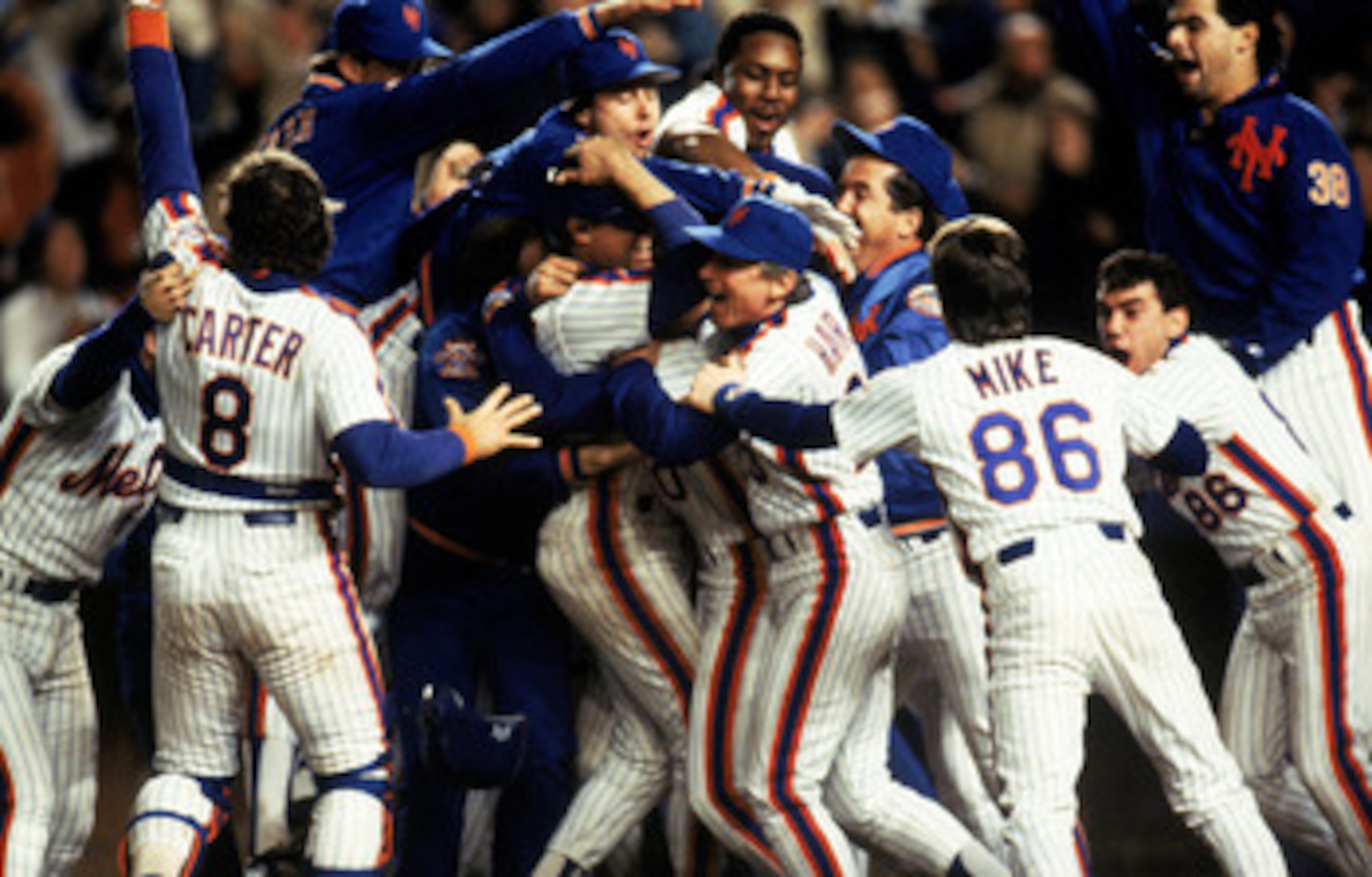 FLUSHING, NY - OCTOBER 27:  The New York Mets celebrate after winning game 7 of the 1986 World Series against the Boston Red Sox at Shea Stadium on October 27, 1986 in Flushing, New York. The Mets won the series 4-3.  (Photo by T.G. Higgins/Getty Images)