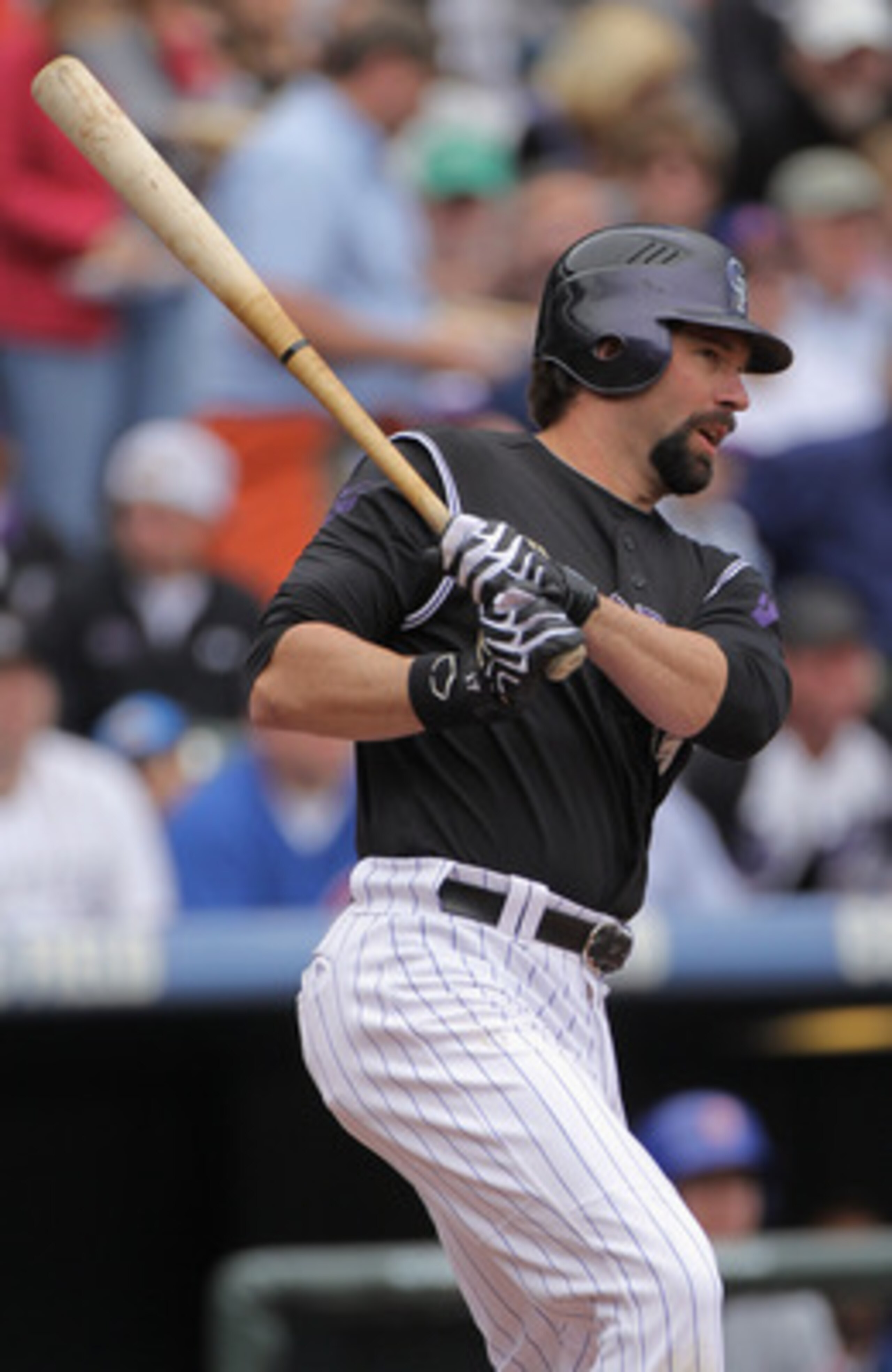 DENVER, CO - APRIL 17:  Todd Helton #17 of the Colorado Rockies takes an at bat against the Chicago Cubs at Coors Field on April 17, 2011 in Denver, Colorado.  (Photo by Doug Pensinger/Getty Images)