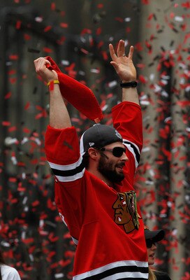 CHICAGO - JUNE 11: Troy Brouwer #22 waves to the corwd during the Chicago Blackhawks Stanley Cup victory parade and rally on June 11, 2010 in Chicago, Illinois. (Photo by Jonathan Daniel/Getty Images) CHICAGO - JUNE 11: Troy Brouwer #22 waves to the corwd during the Chicago Blackhawks Stanley Cup victory parade and rally on June 11, 2010 in Chicago, Illinois. (Photo by Jonathan Daniel/Getty Images)