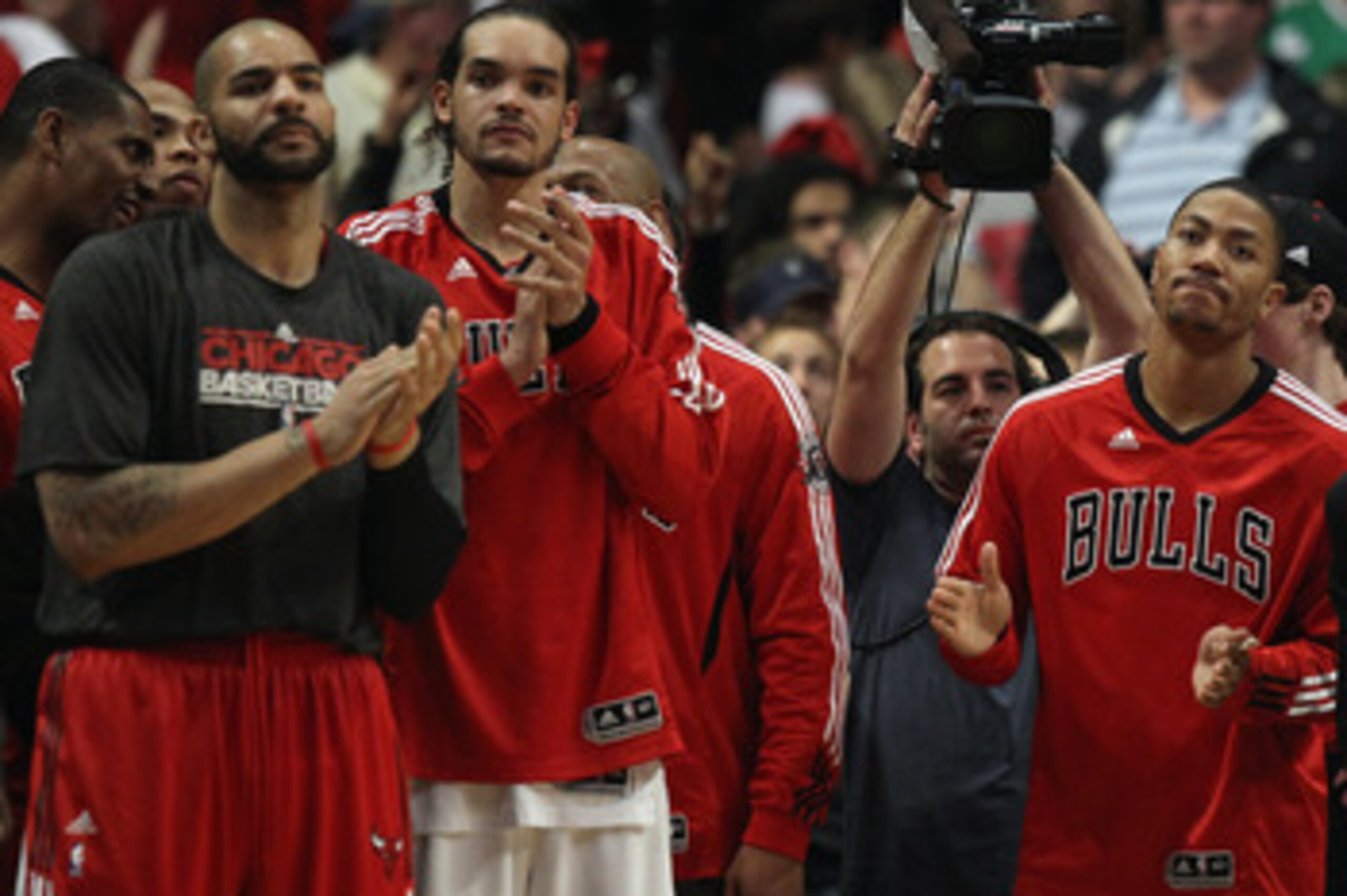 CHICAGO, IL - APRIL 26: (L-R) Carlos Boozer #5, Joakim Noah #13 and Derrick Rose #1 of the Chicago Bulls celebrate a win over the Indiana Pacers in Game Five of the Eastern Conference Quarterfinals in the 2011 NBA Playoffs at the United Center on April 26 CHICAGO, IL - APRIL 26: (L-R) Carlos Boozer #5, Joakim Noah #13 and Derrick Rose #1 of the Chicago Bulls celebrate a win over the Indiana Pacers in Game Five of the Eastern Conference Quarterfinals in the 2011 NBA Playoffs at the United Center on April 26