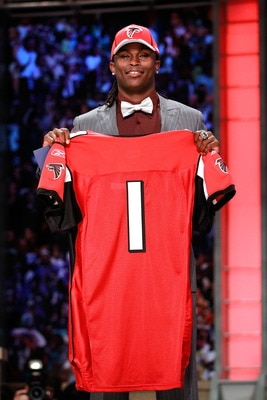 NEW YORK, NY - APRIL 28:  Julio Jones, #6 overall pick by the Atlanta Falcons, holds up a jersey on stage during the 2011 NFL Draft at Radio City Music Hall on April 28, 2011 in New York City.  (Photo by Chris Trotman/Getty Images)