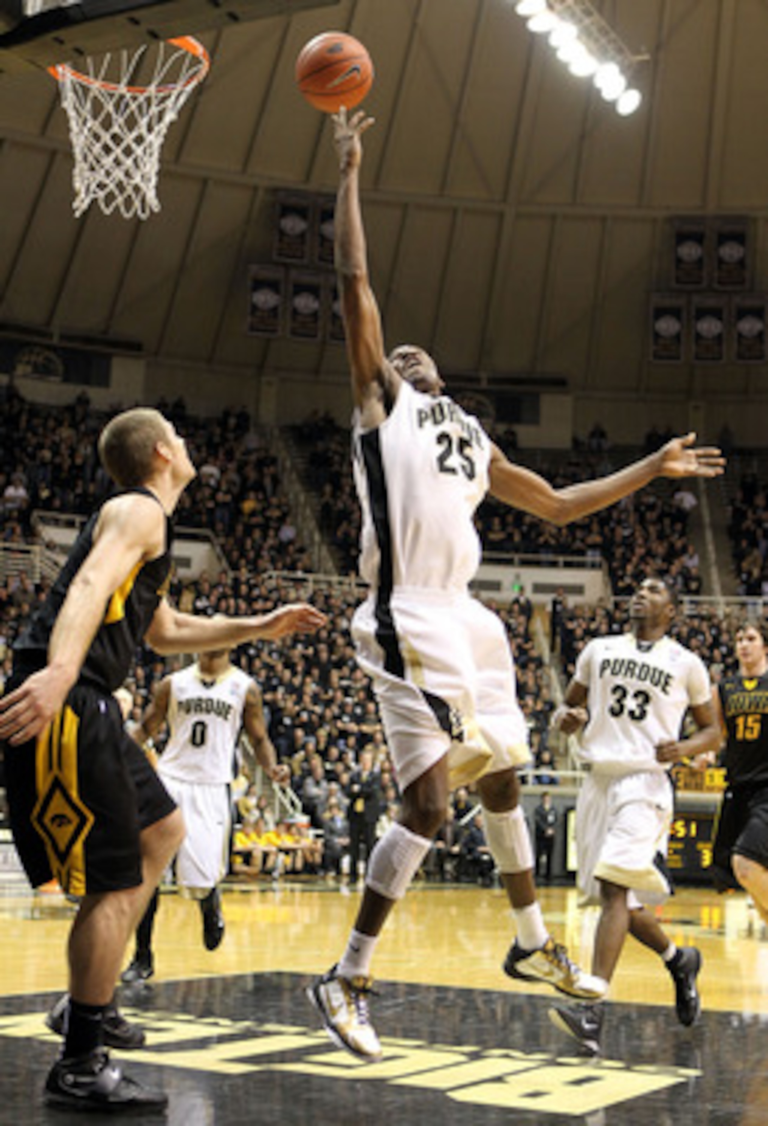 WEST LAFAYETTE, IN - JANUARY 09:  JaJuan Johnson #25 of the Purdue Boilermakers shoots the ball during the Big Ten Conference game against the Iowa Hawkeyes at Mackey Arena on January 9, 2011 in West Lafayette, Indiana.  Purdue won 75-52.  (Photo by Andy 