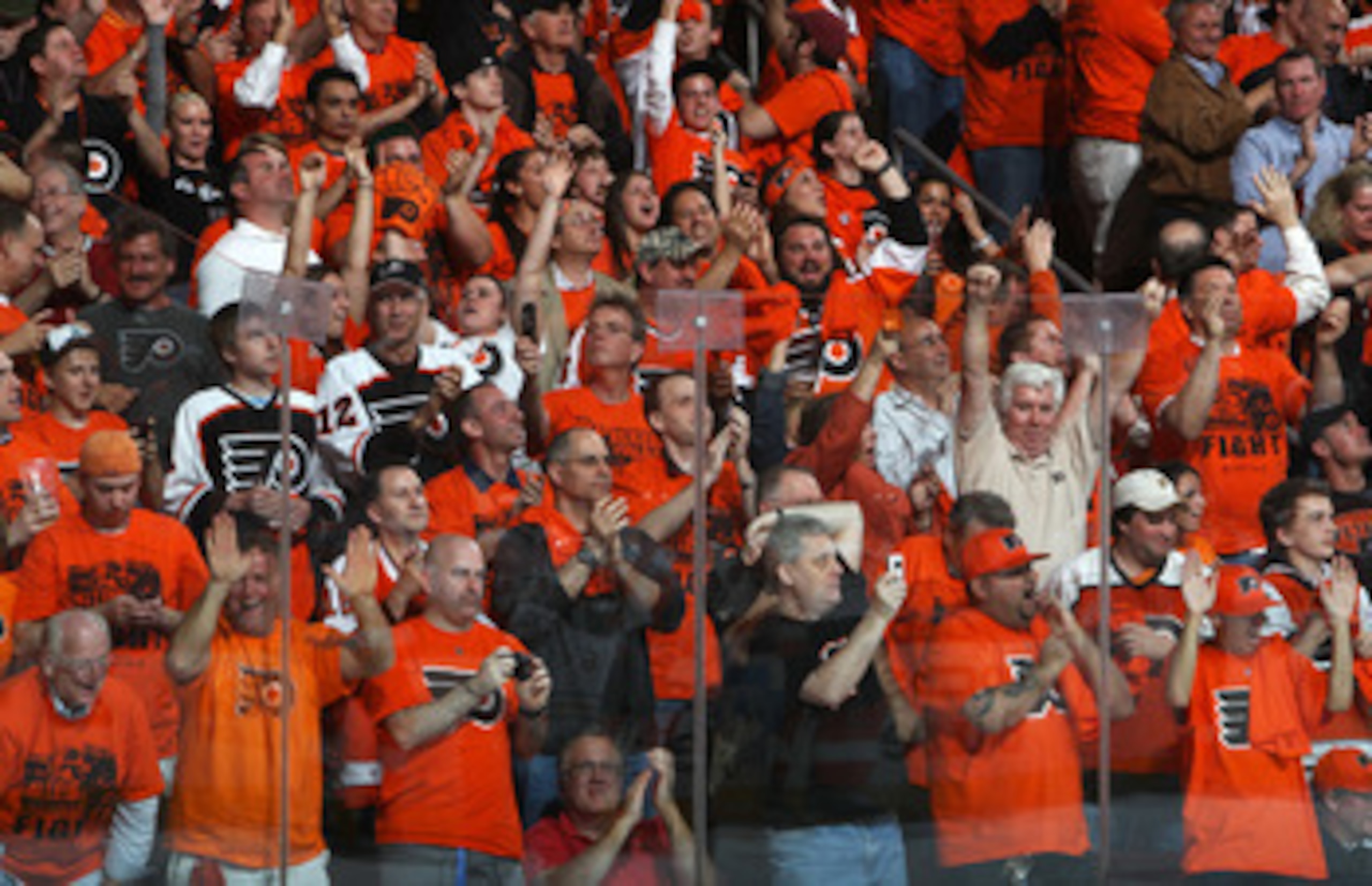 PHILADELPHIA, PA - APRIL 26: Philadelphia Flyers fans celebrate during the second period of their game against the Buffalo Sabres in Game Seven of the Eastern Conference Quarterfinals during the 2011 NHL Stanley Cup Playoffs at Wells Fargo Center on Apri PHILADELPHIA, PA - APRIL 26: Philadelphia Flyers fans celebrate during the second period of their game against the Buffalo Sabres in Game Seven of the Eastern Conference Quarterfinals during the 2011 NHL Stanley Cup Playoffs at Wells Fargo Center on Apri