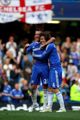 LONDON, ENGLAND - APRIL 30:   (L to R) John Terry and David Luiz of Chelsea celebrate following their team's 2-1 victory during the Barclays Premier League match between Chelsea and Tottenham Hotspur at Stamford Bridge on April 30, 2011 in London, England