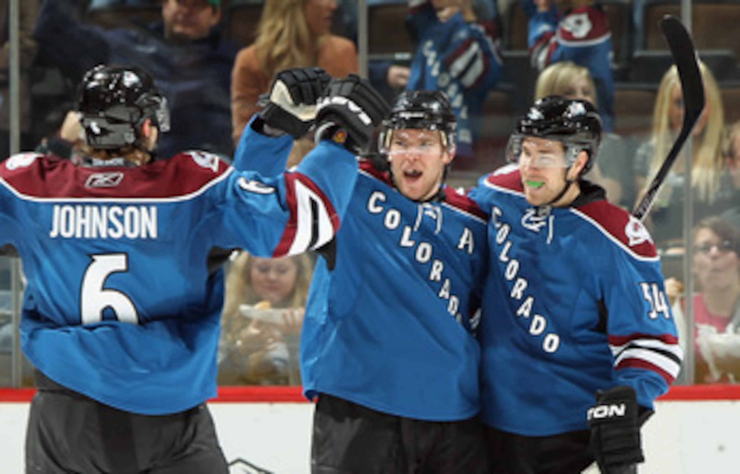 DENVER, CO - MARCH 11:  David Jones #54 of the Colorado Avalanche celebrates his second period goal with teammates Paul Stastny #26 and Erik Johnson #6 against the Anaheim Ducks during NHL action at the Pepsi Center on March 11, 2011 in Denver, Colorado.
