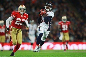 LONDON, ENGLAND - OCTOBER 31: Brandon Lloyd #84 of Denver Broncos catches the ball ahead of Taylor Mays #23 of San Francisco 49ers during the NFL International Series match between Denver Broncos and San Francisco 49ers at Wembley Stadium on October 31, LONDON, ENGLAND - OCTOBER 31: Brandon Lloyd #84 of Denver Broncos catches the ball ahead of Taylor Mays #23 of San Francisco 49ers during the NFL International Series match between Denver Broncos and San Francisco 49ers at Wembley Stadium on October 31,