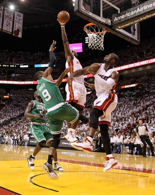 MIAMI, FL - MAY 01:  LeBron James #6 and Dwyane Wade #3 of the Miami Heat block a shot from Rajon Rondo #9 of the Boston Celtics during Game One of the Eastern Conference Semifinals of the 2011 NBA Playoffs at American Airlines Arena on May 1, 2011 in Mia
