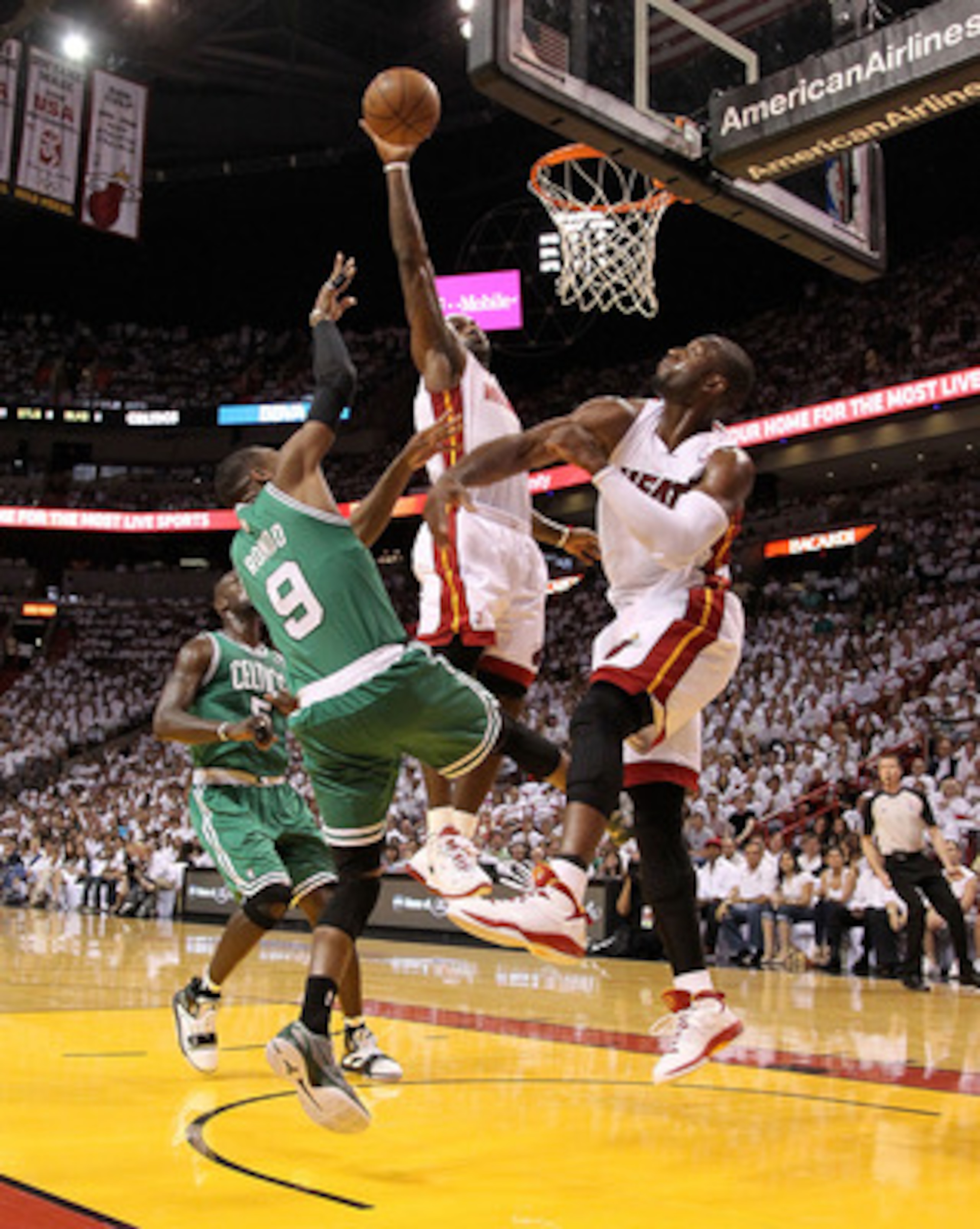 MIAMI, FL - MAY 01:  LeBron James #6 and Dwyane Wade #3 of the Miami Heat block a shot from Rajon Rondo #9 of the Boston Celtics during Game One of the Eastern Conference Semifinals of the 2011 NBA Playoffs at American Airlines Arena on May 1, 2011 in Mia
