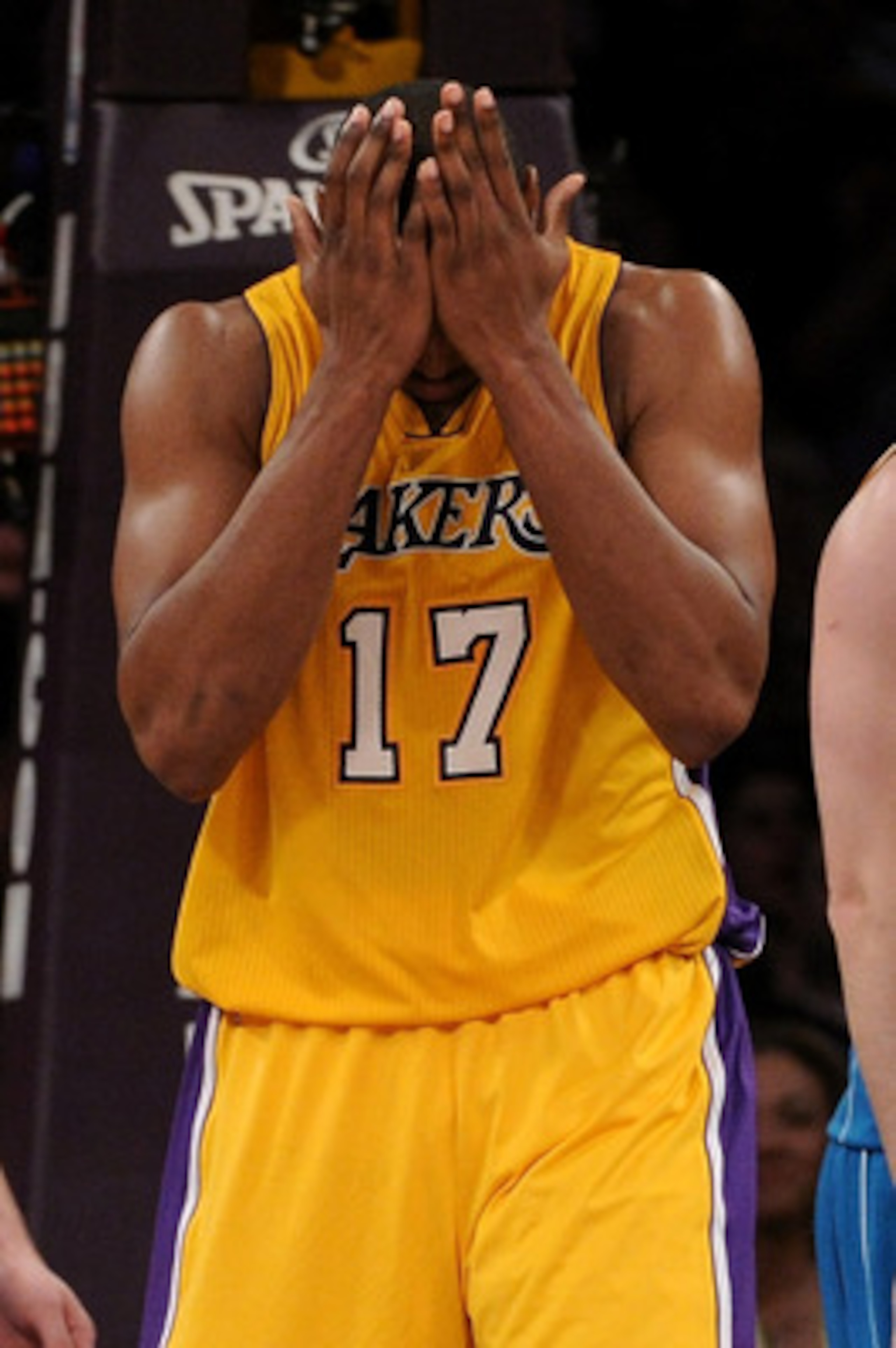 LOS ANGELES, CA - APRIL 26:  Andrew Bynum #17 of the Los Angeles Lakers reacts in the third quarter after making a basket and getting fouled against the New Orleans Hornets in Game Five of the Western Conference Quarterfinals in the 2011 NBA Playoffs on A