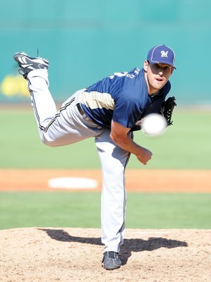 GOODYEAR, AZ - MARCH 11:  Mark Rogers #64 of the Milwaukee Brewers pitches during a Spring Training game against the Cincinnati Reds on March 11, 2010 at Goodyear Ballpark in Goodyear, Arizona.  (Photo by Lisa Blumenfeld/Getty Images)