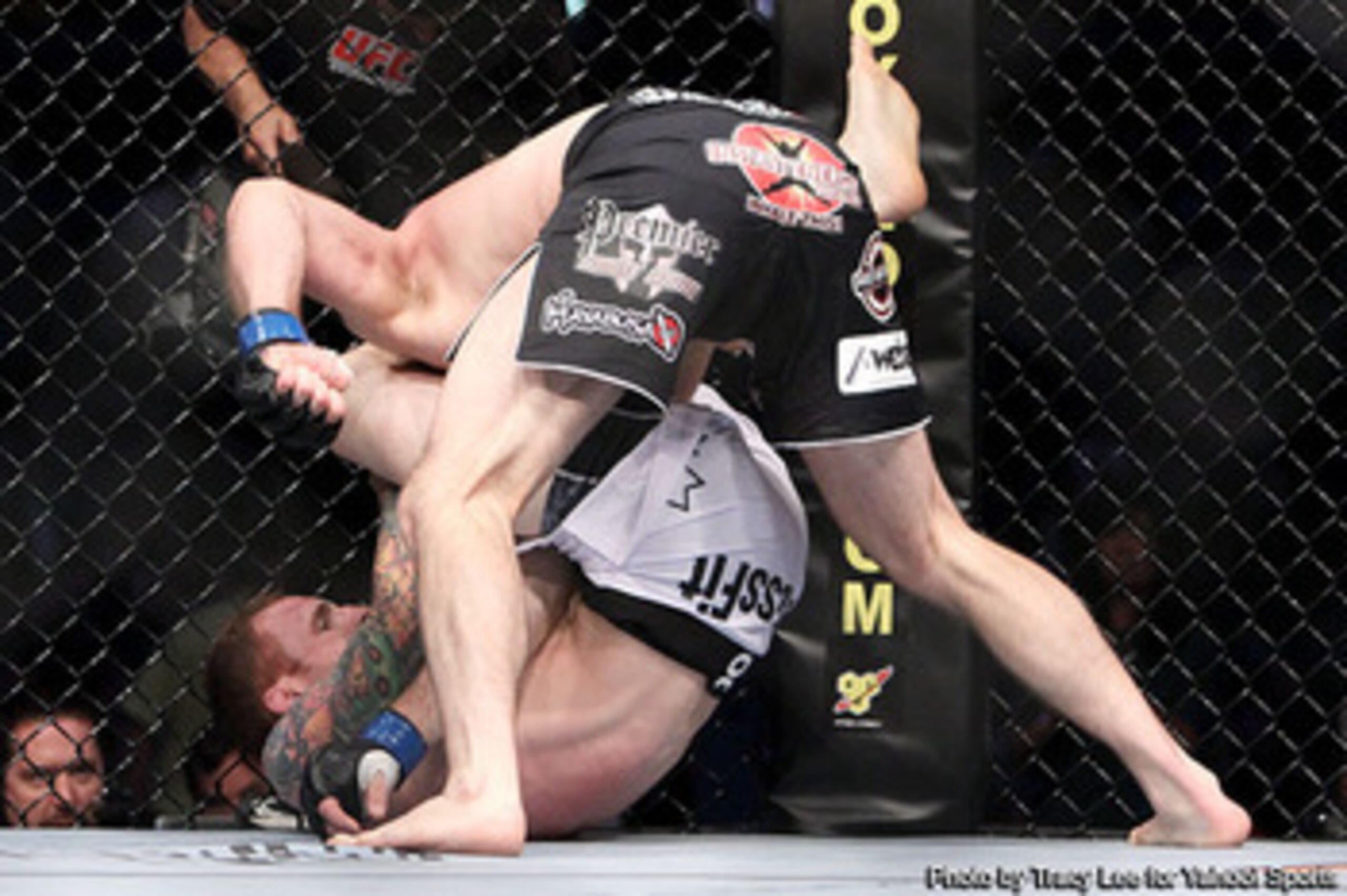 Jason MacDonald securing a triangle choke victory
