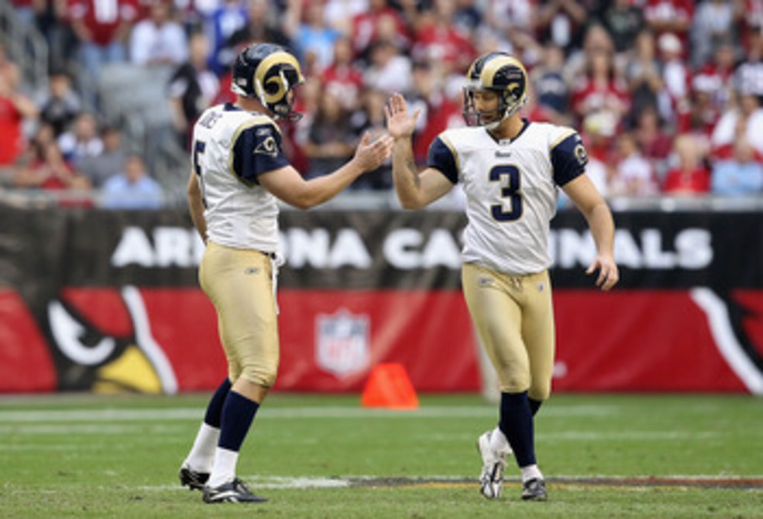 GLENDALE, AZ - DECEMBER 05: Kicker Josh Brown #3 of the St. Louis Rams high fives teammate Donnie Jones #5 after Brown kicked a 52 yard field goal against the Arizona Cardinals during the second quarter of the NFL game at the University of Phoenix Stadiu GLENDALE, AZ - DECEMBER 05: Kicker Josh Brown #3 of the St. Louis Rams high fives teammate Donnie Jones #5 after Brown kicked a 52 yard field goal against the Arizona Cardinals during the second quarter of the NFL game at the University of Phoenix Stadiu