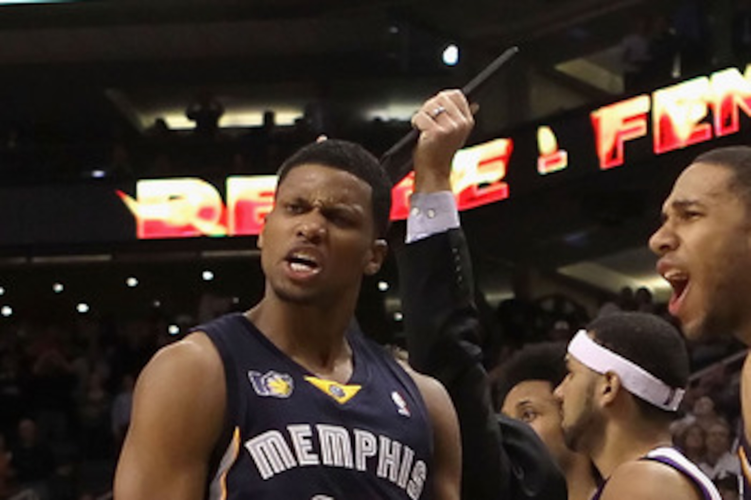 PHOENIX - DECEMBER 08:  Rudy Gay #22 of the Memphis Grizzlies reacts with Xavier Henry #13 after Gay hit the game tying three point shot against the Phoenix Suns at the end of regulation in the NBA game at US Airways Center on December 8, 2010 in Phoenix,