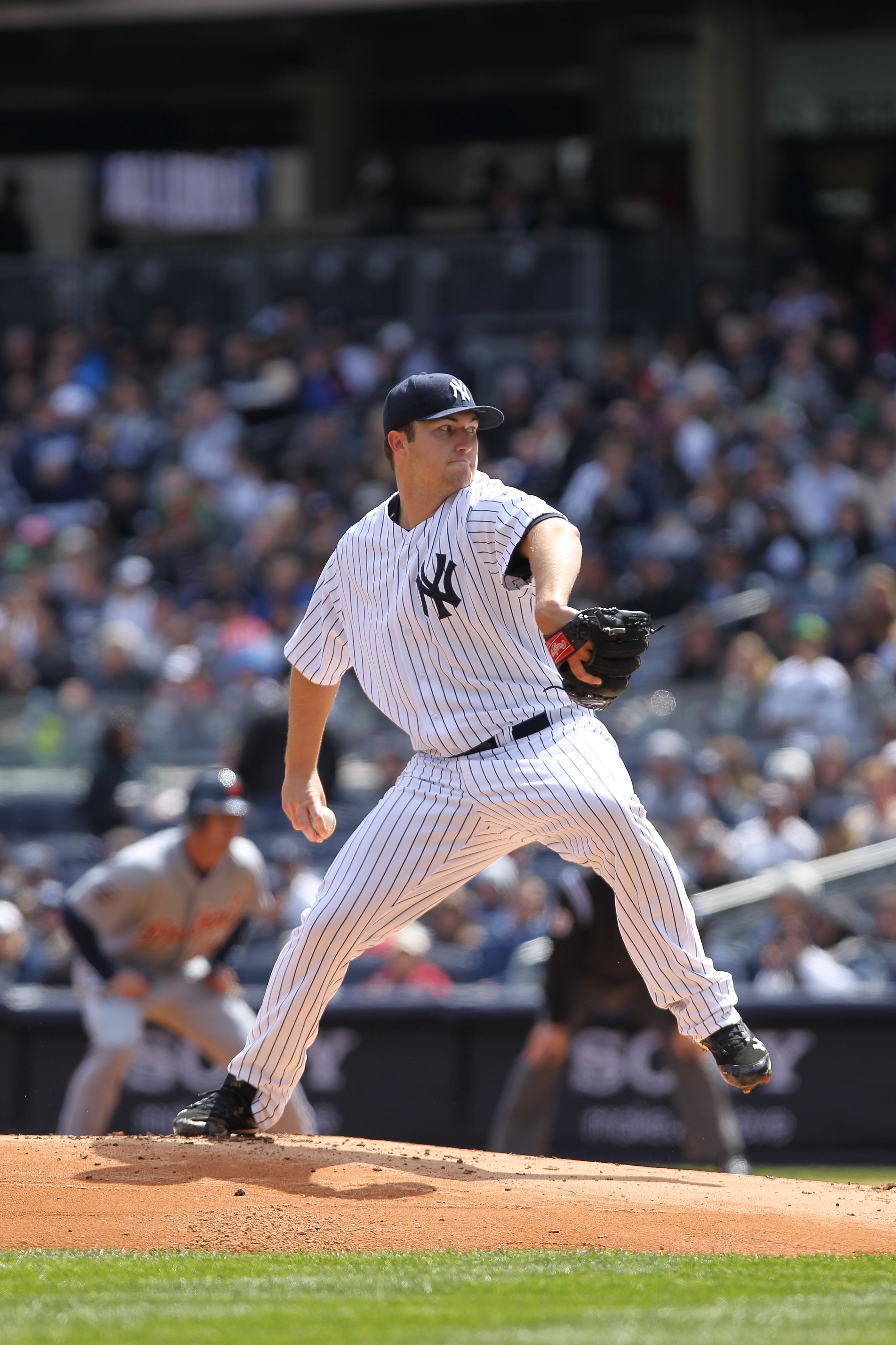 NEW YORK, NY - APRIL 03:  Phil Hughes #65 of the New York Yankees pitches against the Detroit Tigers at Yankee Stadium on April 3, 2011 in the Bronx borough of New York City.  (Photo by Nick Laham/Getty Images)