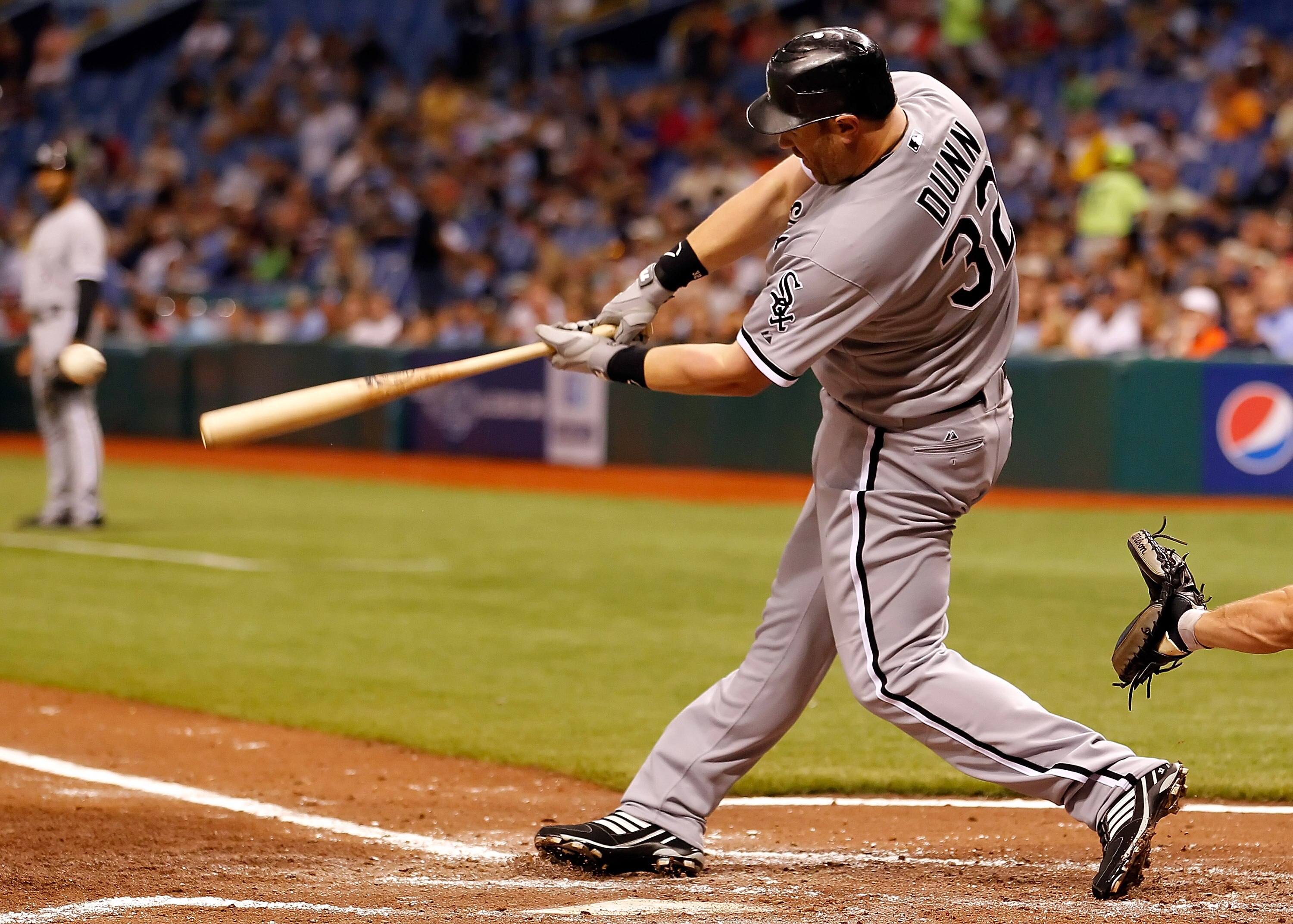 ST. PETERSBURG, FL - APRIL 21:  Designated hitter Adam Dunn #32 of the Chicago White Sox fouls off a pitch against the Tampa Bay Rays during the game at Tropicana Field on April 21, 2011 in St. Petersburg, Florida.  (Photo by J. Meric/Getty Images)