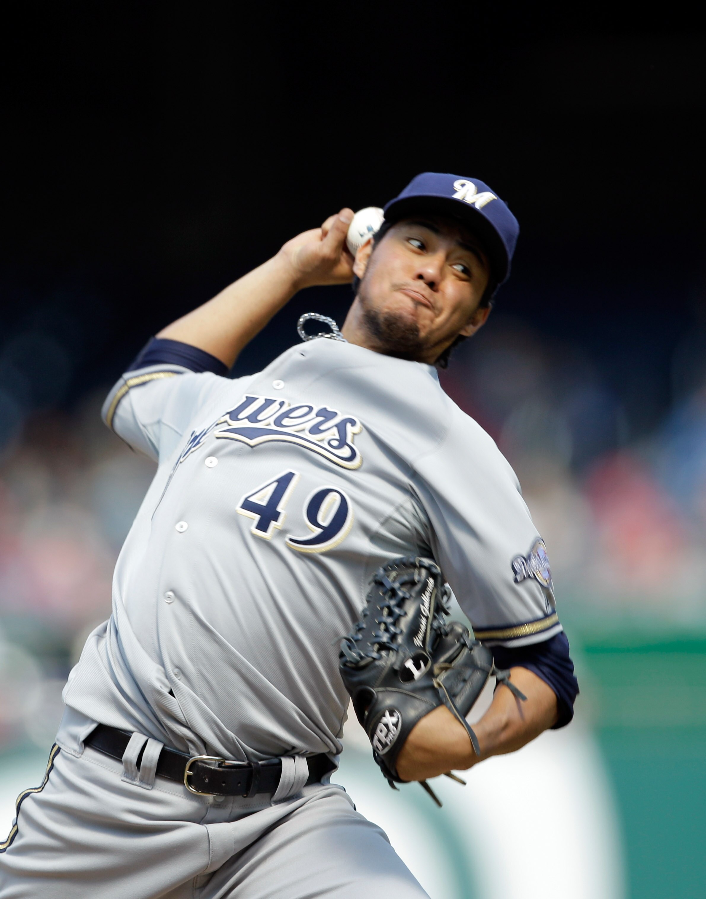 WASHINGTON, DC - APRIL 17: Pitcher Yovani Gallardo #49 of the Milwaukee Brewers delivers to a Washington Nationals batter at Nationals Park on April 17, 2011 in Washington, DC.  (Photo by Rob Carr/Getty Images)