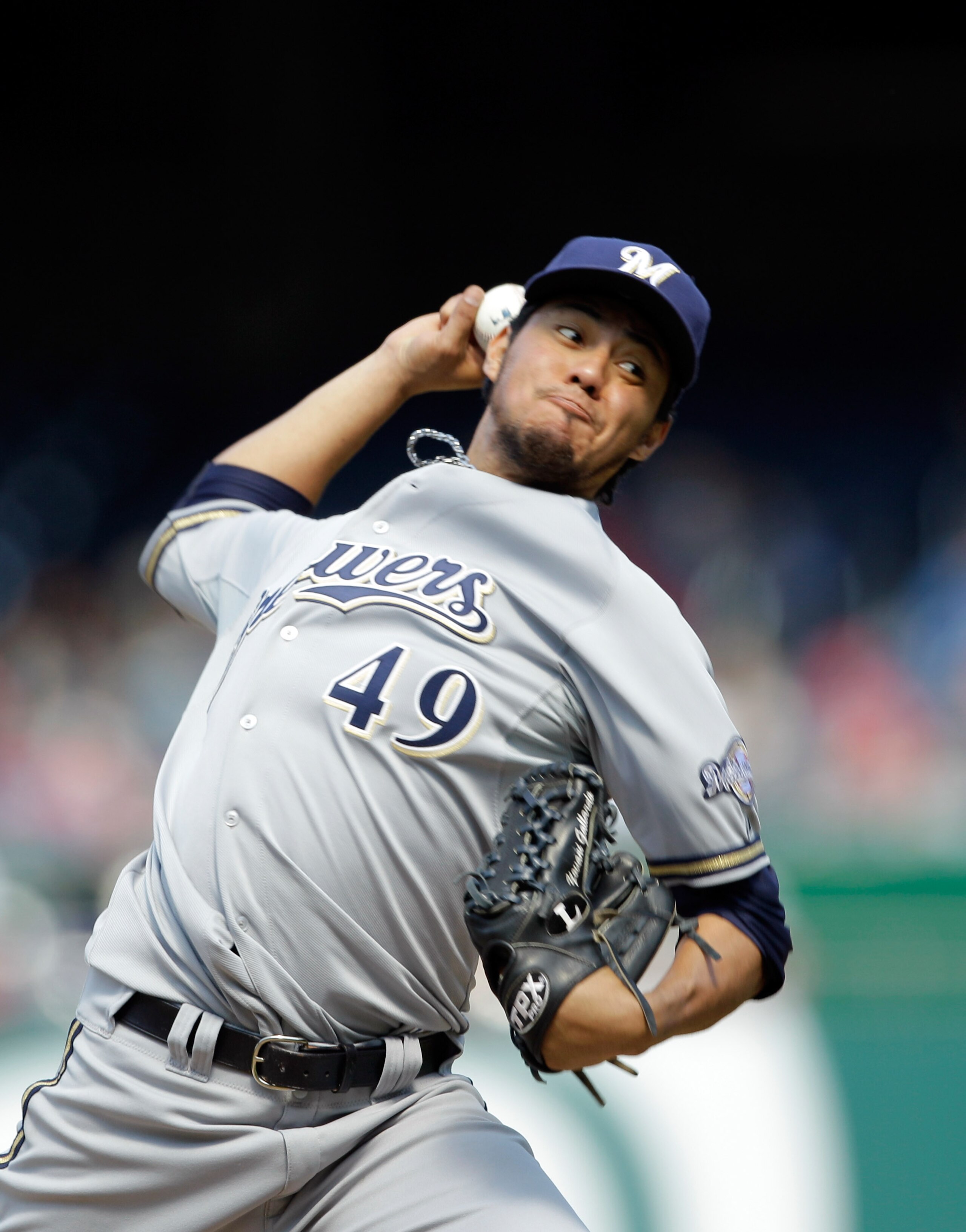 WASHINGTON, DC - APRIL 17: Pitcher Yovani Gallardo #49 of the Milwaukee Brewers delivers to a Washington Nationals batter at Nationals Park on April 17, 2011 in Washington, DC.  (Photo by Rob Carr/Getty Images)