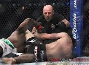 Pablo Garza securing a triangle choke victory over Yves Jabouin