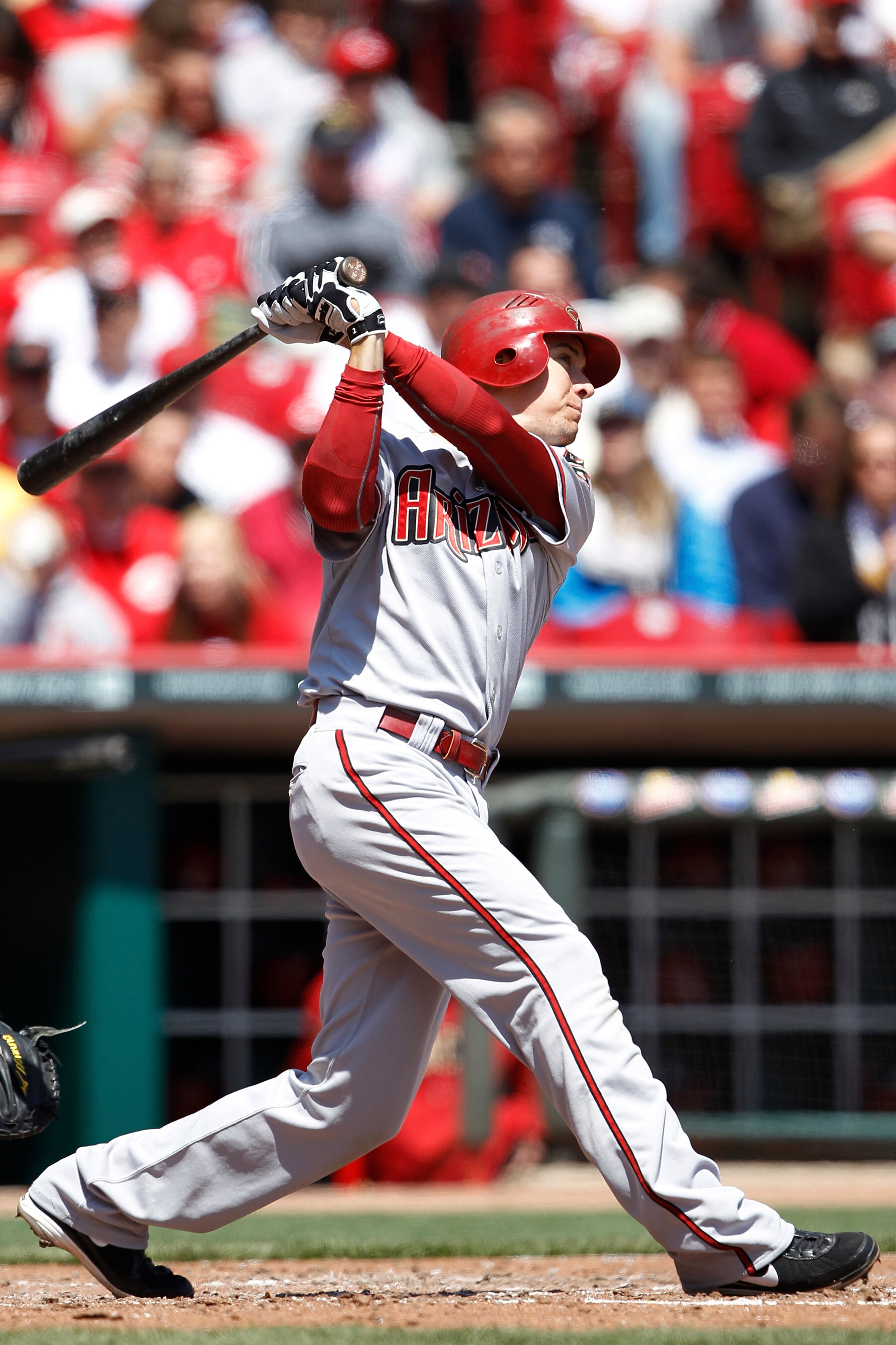 CINCINNATI, OH - APRIL 21: Kelly Johnson #2 of the Arizona Diamondbacks hits a solo home run in the fifth inning against the Cincinnati Reds at Great American Ball Park on April 21, 2011 in Cincinnati, Ohio. The Reds defeated the Diamondbacks 7-4. (Photo