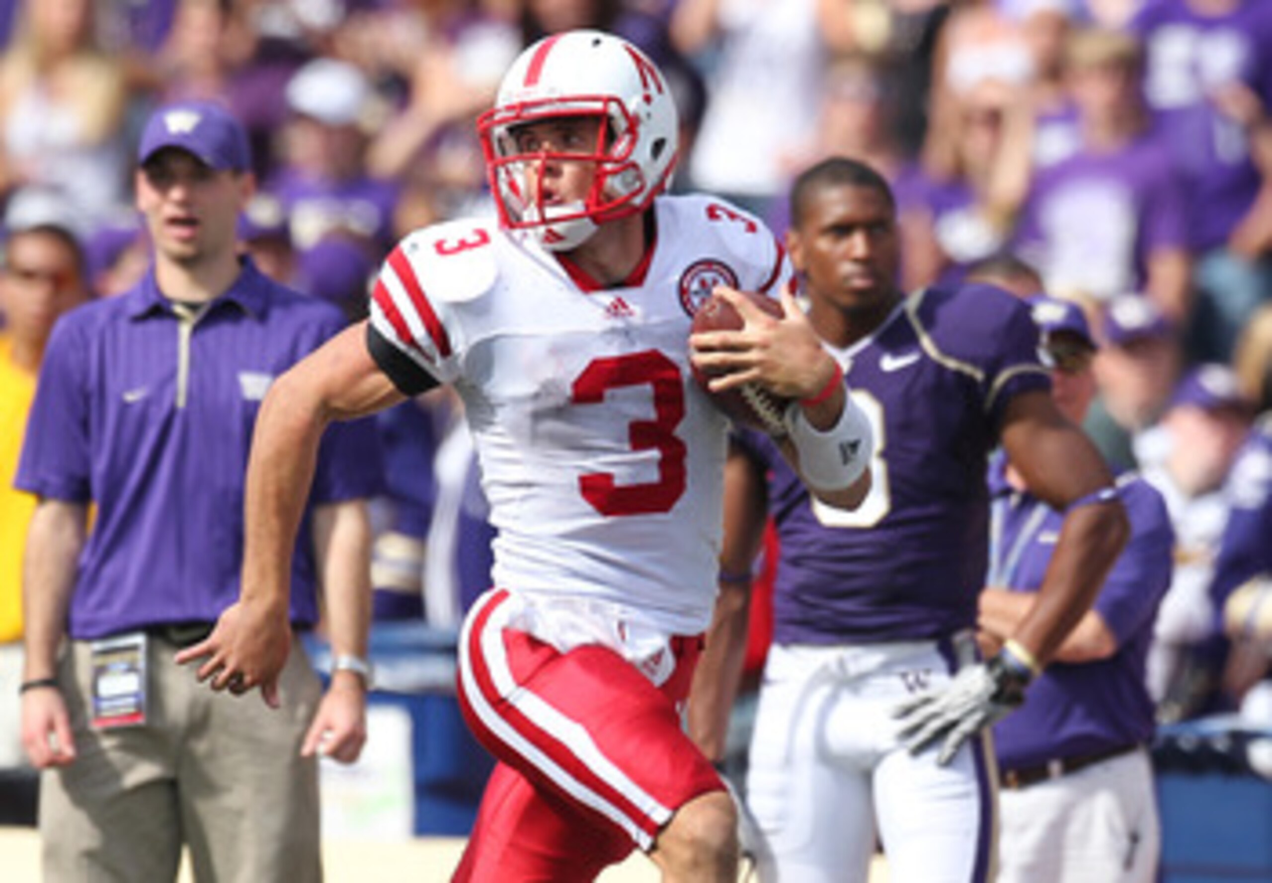 SEATTLE - SEPTEMBER 18: Quarterback Taylor Martinez #3 of the Nebraska Cornhuskers rushes for an 80 yard touchdown run in the third quarter against the Washington Huskies on September 18, 2010 at Husky Stadium in Seattle, Washington. The Cornhuskers defea
