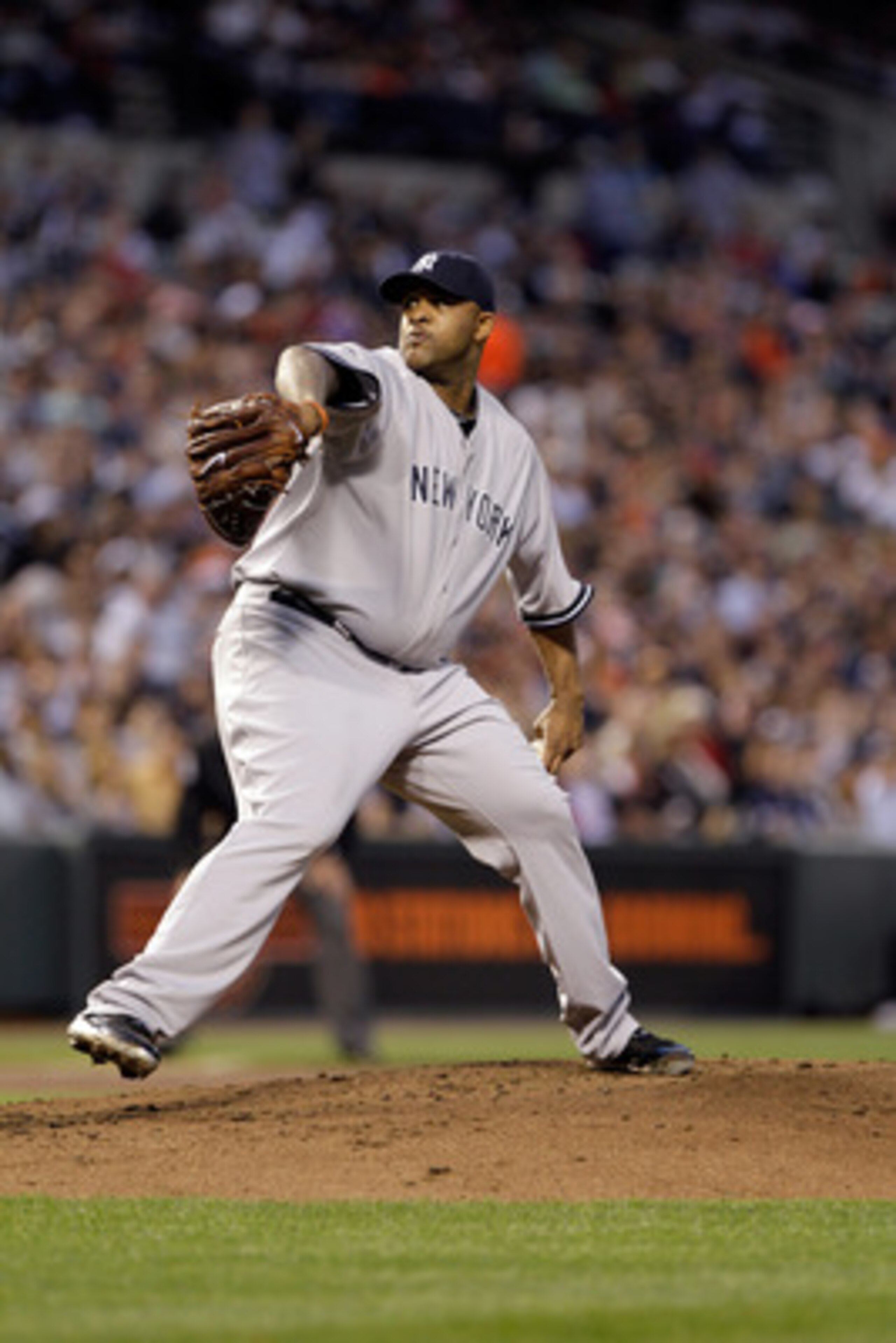 BALTIMORE, MD - APRIL 23:  Pitcher CC Sabathia #52 of the New York Yankees delivers to a Baltimore Orioles batter at Oriole Park at Camden Yards on April 23, 2011 in Baltimore, Maryland.  (Photo by Rob Carr/Getty Images)