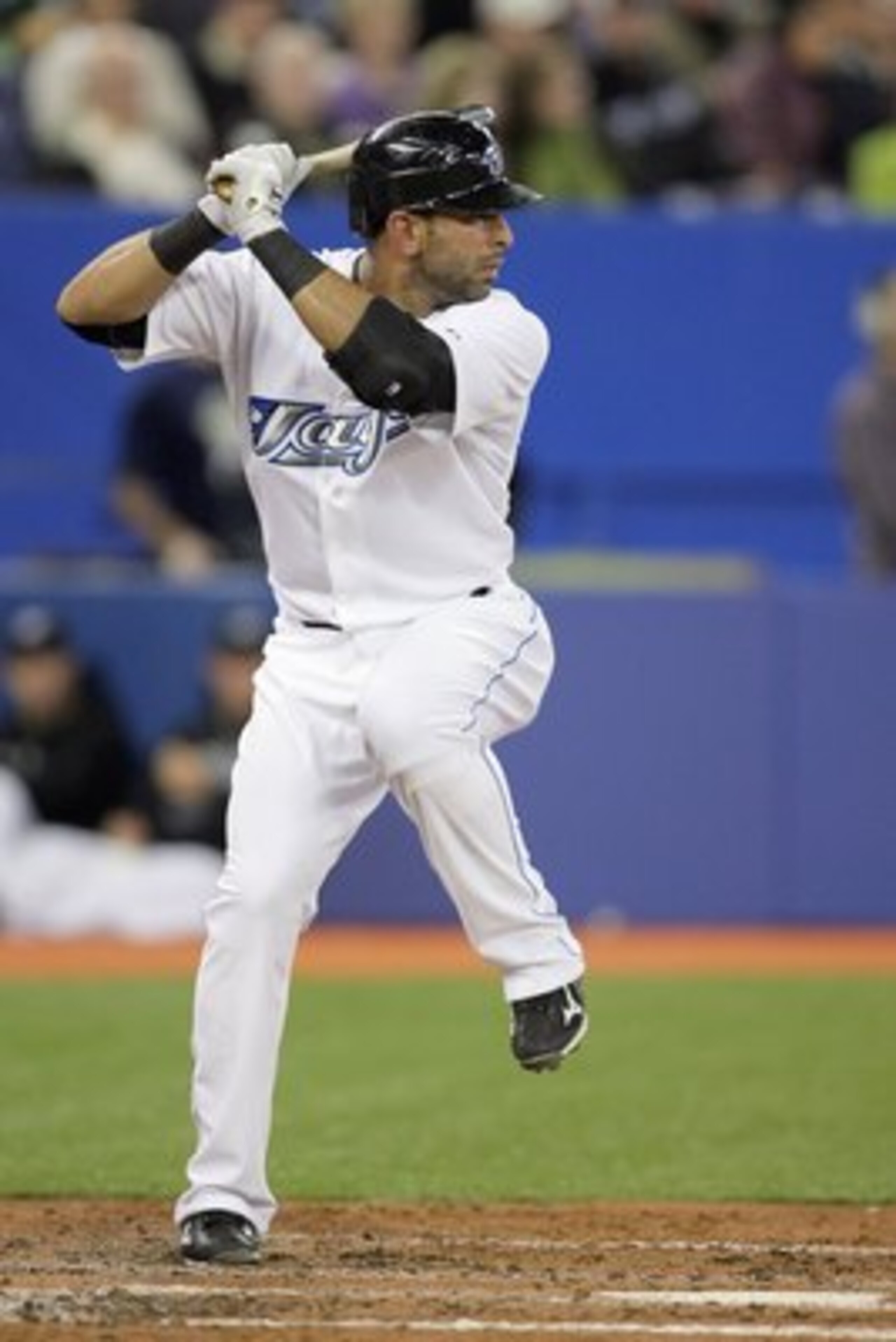 TORONTO - APRIL 12:  Jose Bautista #19 of the Toronto Blue Jays steps into the swing during the game against the Chicago White Sox at the Rogers Centre on April 12, 2010 in Toronto, Ontario. (Photo By Dave Sandford/Getty Images)