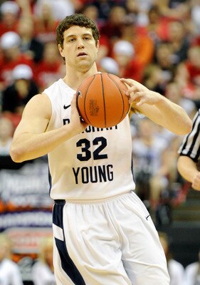 LAS VEGAS, NV - MARCH 12:  Jimmer Fredette #32 of the Brigham Young University Cougars passes the ball during the championship game of the Conoco Mountain West Conference Basketball tournament against the San Diego State Aztecs at the Thomas & Mack Center
