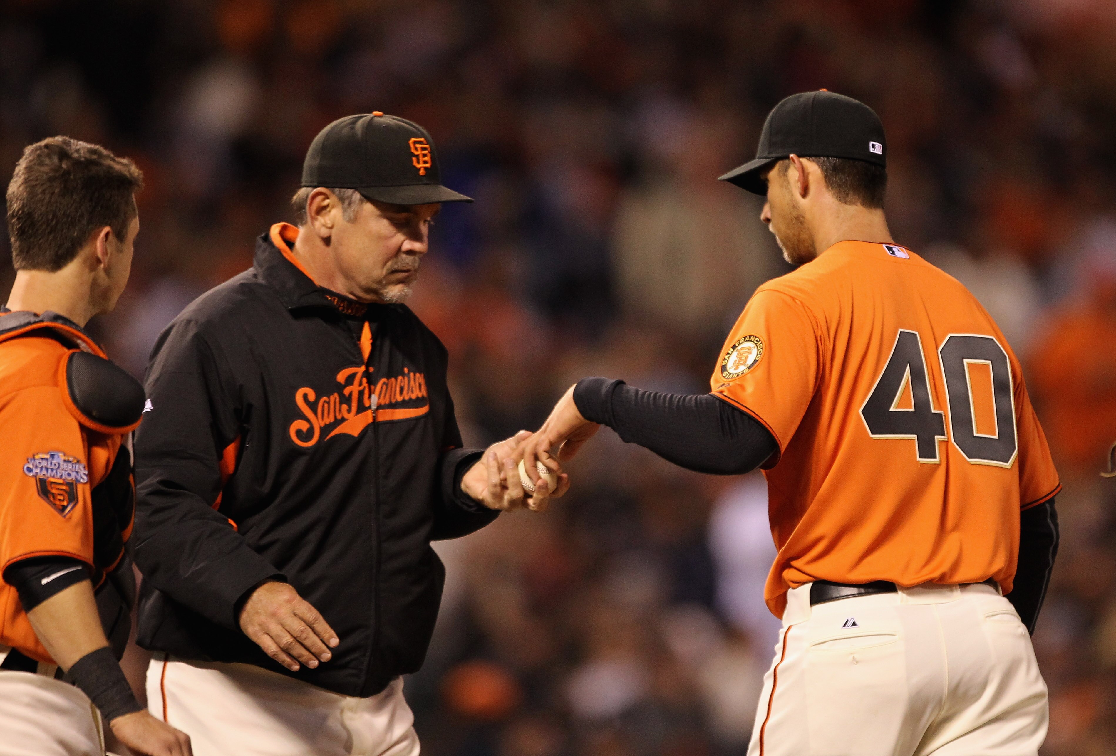 SAN FRANCISCO, CA - APRIL 22: Manager Bruce Bochy takes Madison Bumgarner #40 of the San Francisco Giants out of the game after he gave up four runs to the Atlanta Braves in the third inning at AT&T Park on April 22, 2011 in San Francisco, California.  (P