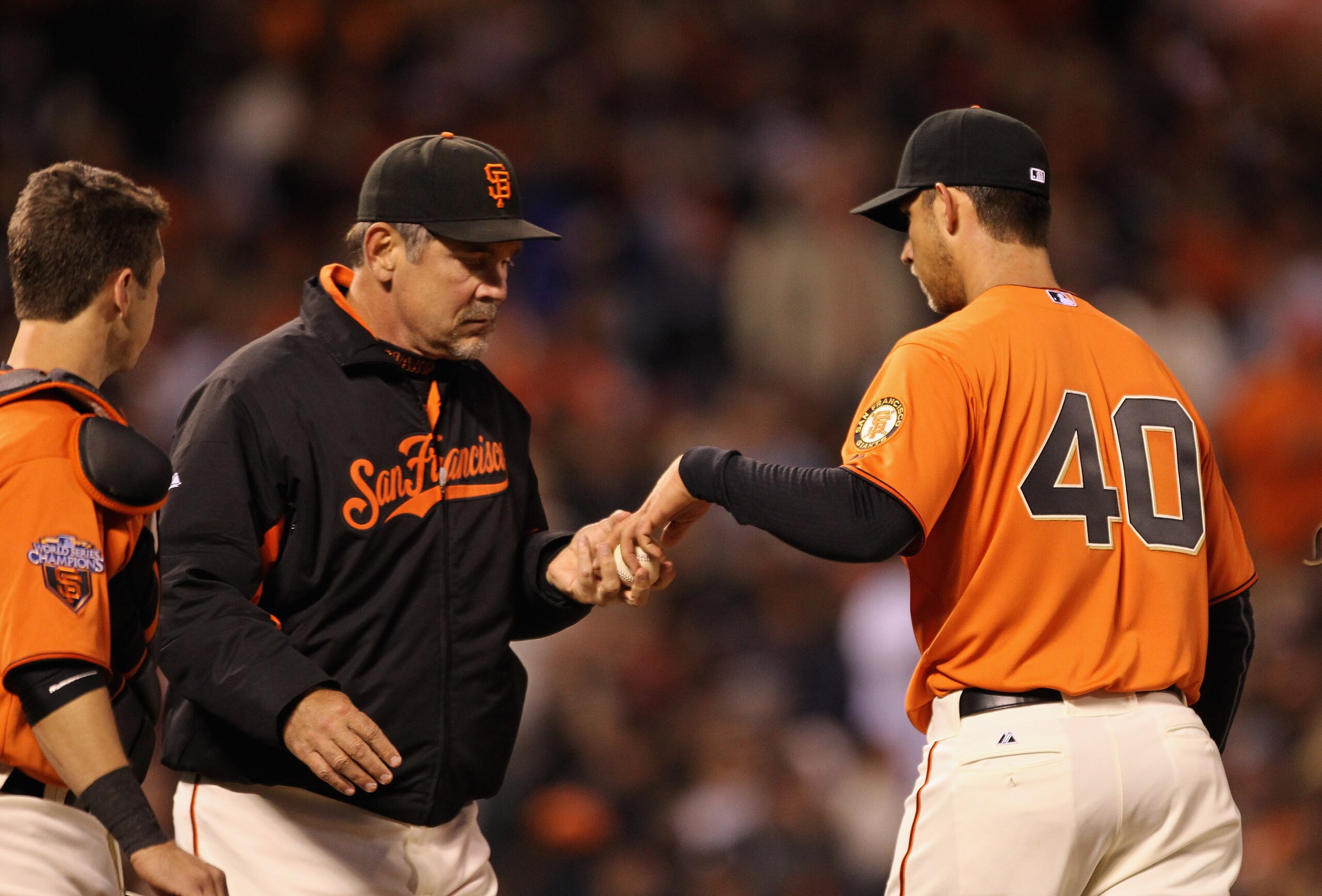 SAN FRANCISCO, CA - APRIL 22: Manager Bruce Bochy takes Madison Bumgarner #40 of the San Francisco Giants out of the game after he gave up four runs to the Atlanta Braves in the third inning at AT&T Park on April 22, 2011 in San Francisco, California.  (P