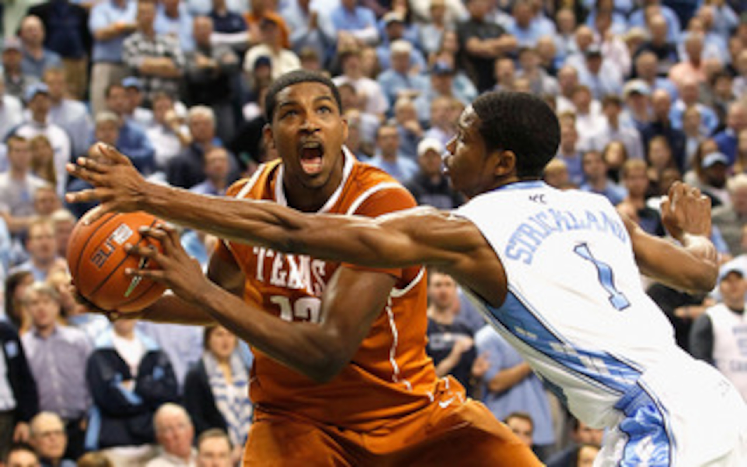 GREENSBORO, NC - DECEMBER 18:  Tristan Thompson #13 of the Texas Longhorns against Dexter Strickland #1 of the North Carolina Tar Heels at Greensboro Coliseum on December 18, 2010 in Greensboro, North Carolina.  (Photo by Kevin C. Cox/Getty Images)