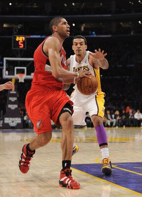 LOS ANGELES, CA - MARCH 20:  Nicolas Batum #88 of the Portland Trail Blazers is chased by Matt Barnes #9 of the Los Angeles Lakers at the Staples Center on March 20, 2011 in Los Angeles, California.  NOTE TO USER: User expressly acknowledges and agrees th