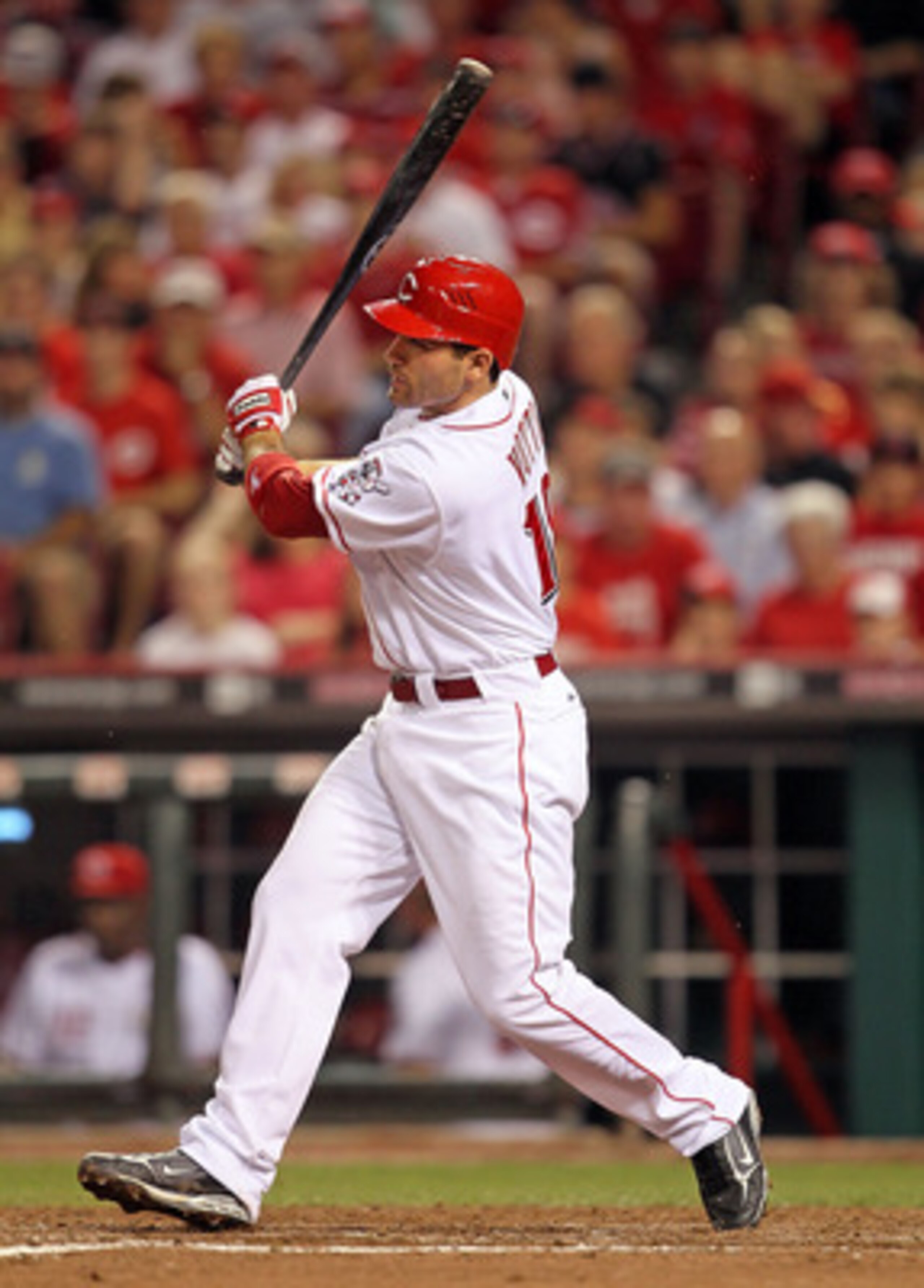 CINCINNATI - JULY 17:  Joey Votto #19 of the Cincinnati Reds swings at a pitch during the game against the Colorado Rockies at Great American Ball Park on July 17, 2010 in Cincinnati, Ohio. He hit two home runs during the game.  (Photo by Andy Lyons/Getty