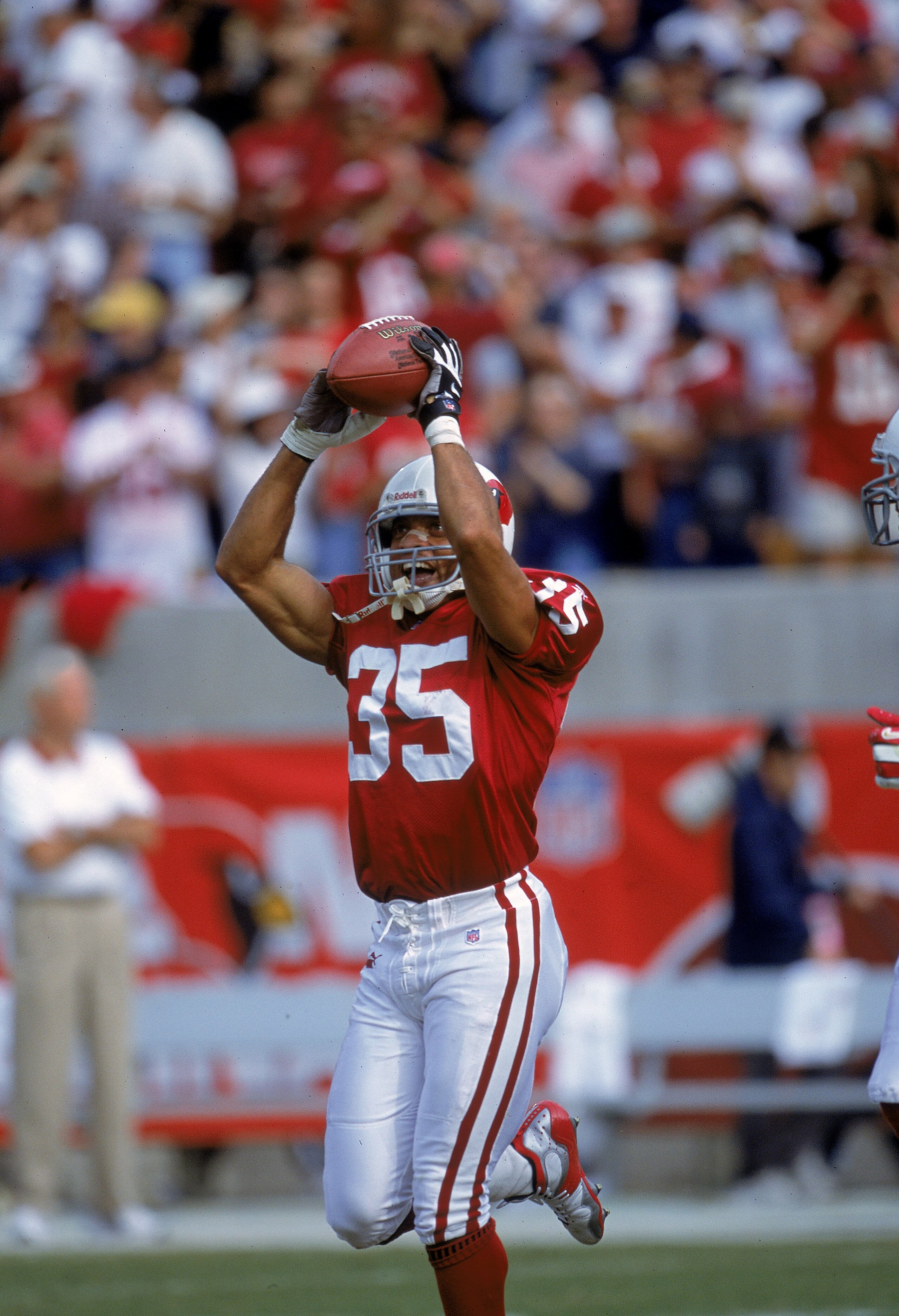 5 Nov 2000:  Aeneas Williams #35 of the Arizona Cardinals carries he ball as he runs down field during the game against the Washington Redskins at the Sun Devil Stadium in Tempe, Arizona.  The Cardinals defeated the Redskins 16-15.Mandatory Credit: Jon Fe