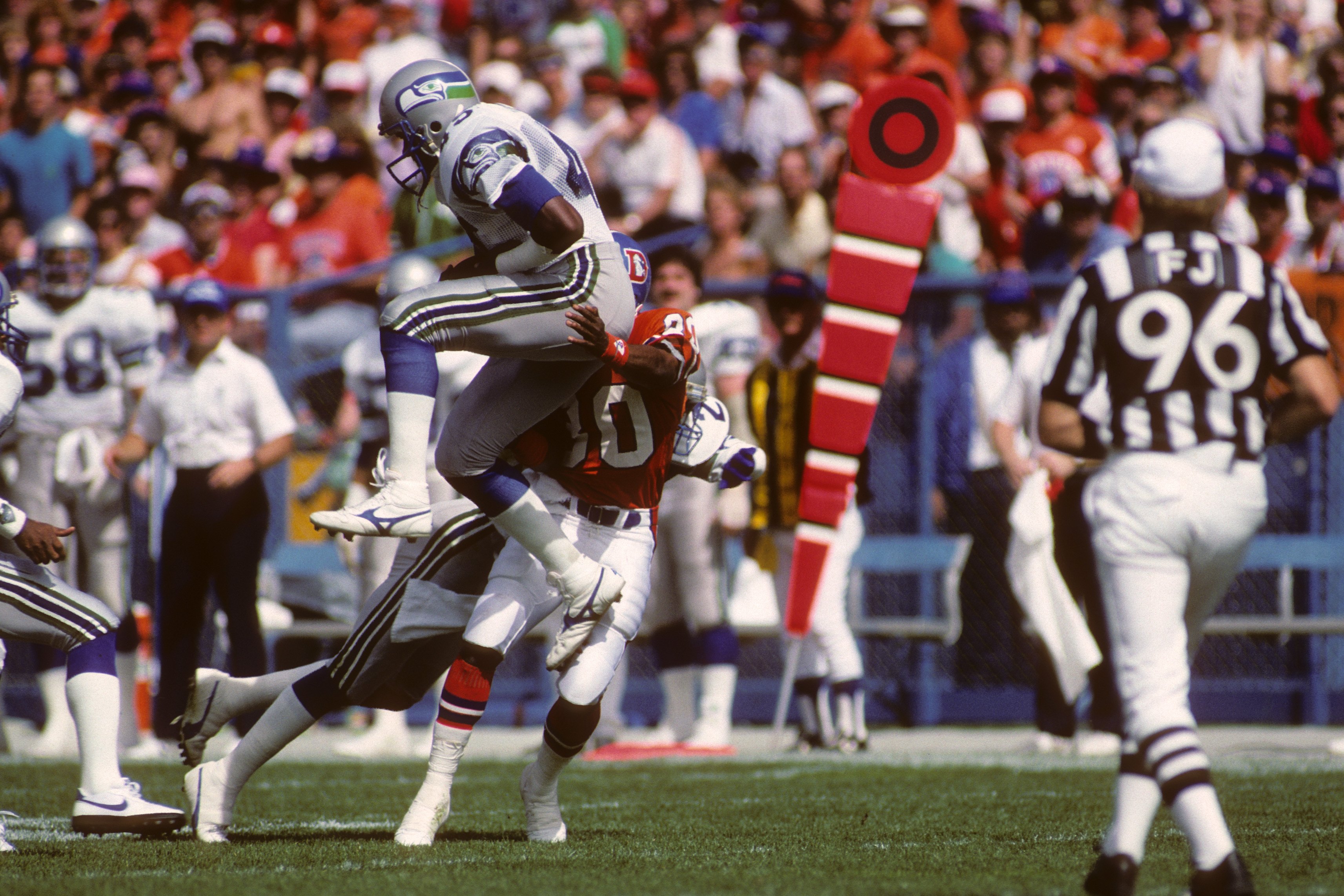 DENVER, CO - SEPTEMBER 13:  Kenny Easley of the Seattle Seahawks intercepts a pass during the game against the Denver Broncos at Mile High Staduim on September 13, 1987 in Denver, Colorado.  The Broncos won 40-17. (Photo by George Rose/Getty Images)