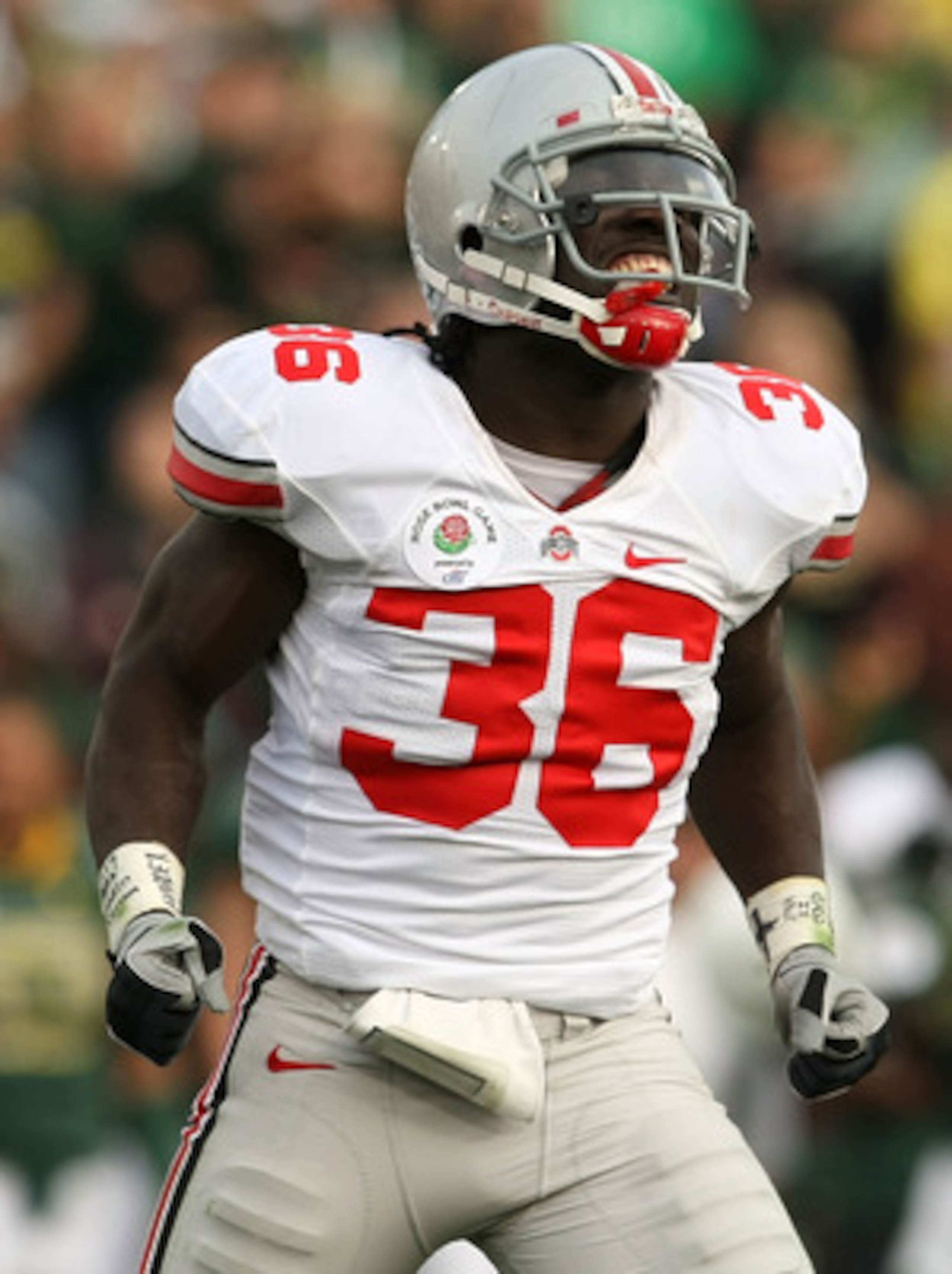 PASADENA, CA - JANUARY 01:  Linebacker Brian Rolle #36 of the Ohio State Buckeyes reacts to a play against the Oregon Ducks in the 96th Rose Bowl game on January 1, 2010 in Pasadena, California.  (Photo by Stephen Dunn/Getty Images)