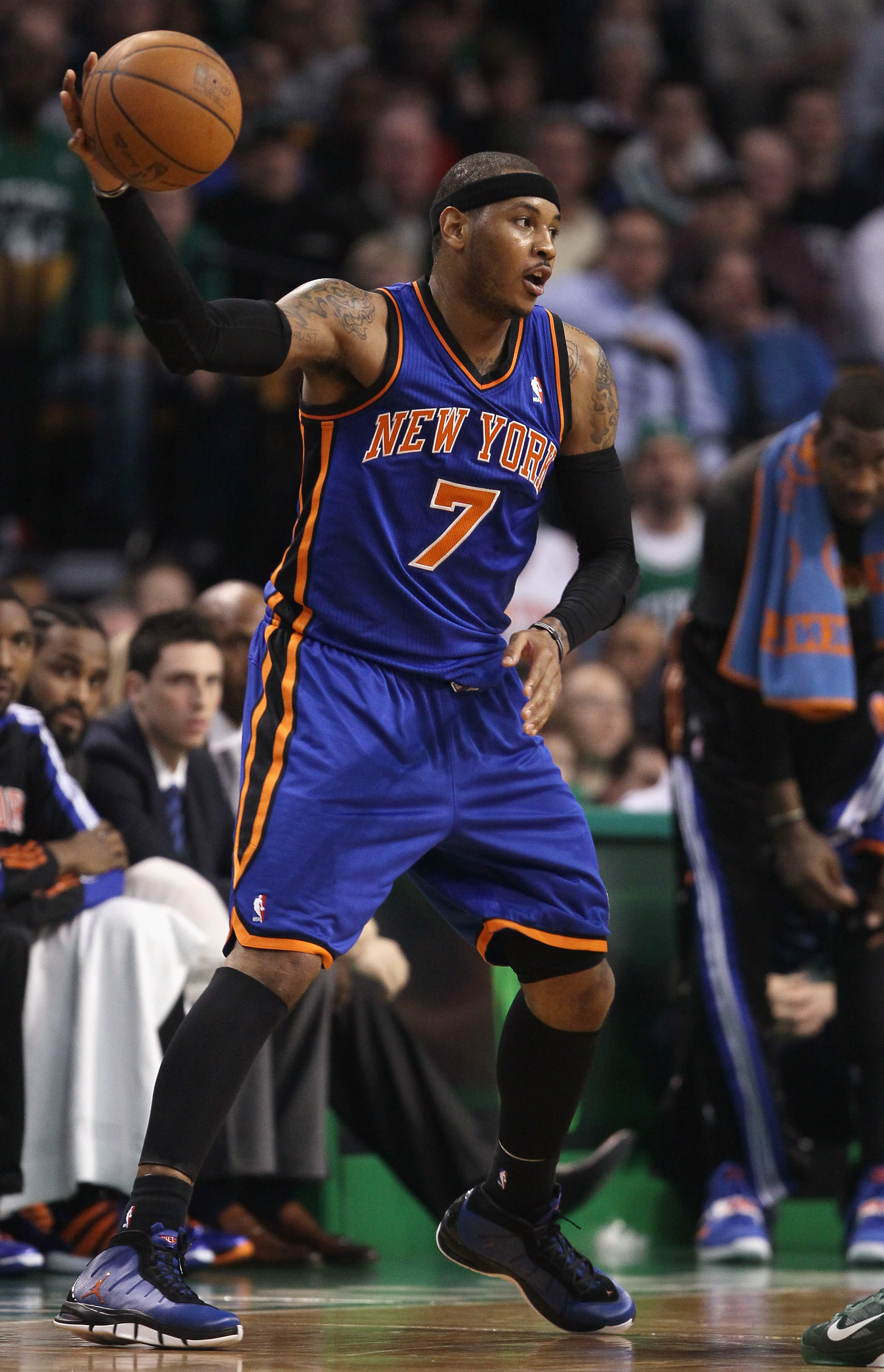 BOSTON, MA - APRIL 19:  Carmelo Anthony #7 of the New York Knicks grabs the ball in the first quarter against the Boston Celtics in Game Two of the Eastern Conference Quarterfinals in the 2011 NBA Playoffs on April 19, 2011 at the TD Garden in Boston, Mas