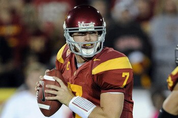 LOS ANGELES, CA - OCTOBER 30:  Matt Barkley #7 of the USC Trojans rolls out of the pocket against the Oregon Ducks at Los Angeles Memorial Coliseum on October 30, 2010 in Los Angeles, California.  (Photo by Harry How/Getty Images)