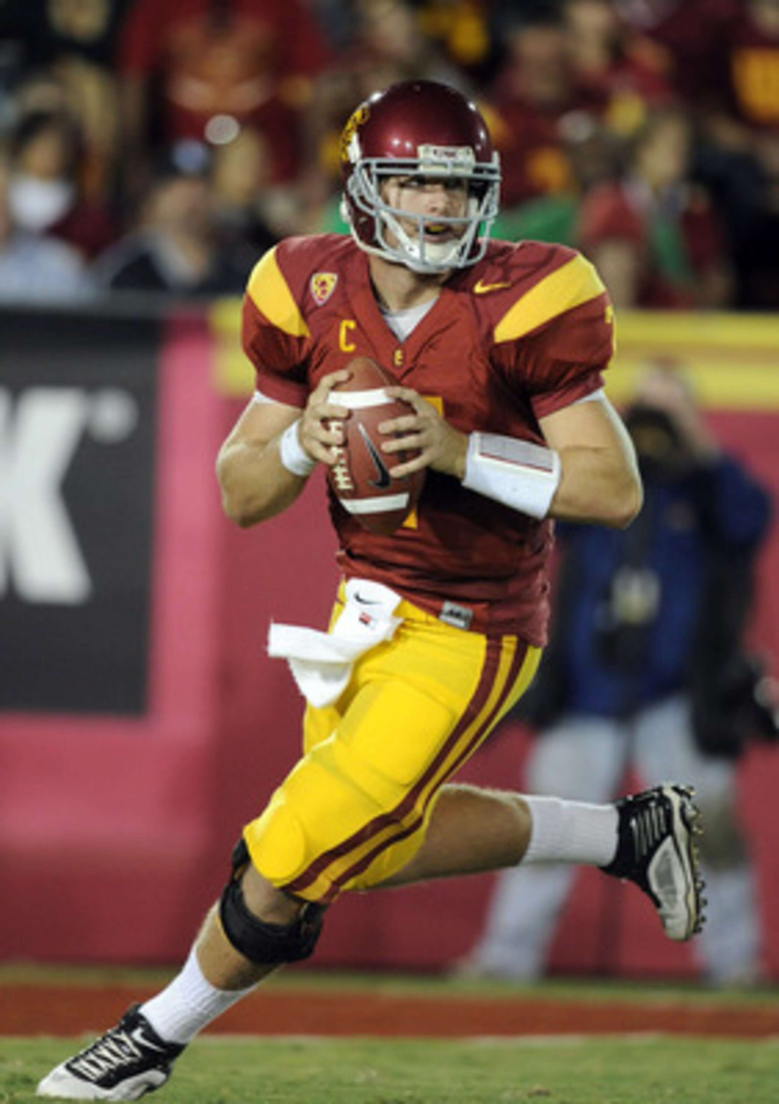 LOS ANGELES, CA - OCTOBER 30:  Matt Barkley #7 of the USC Trojans rolls out of the pocket against the Oregon Ducks at Los Angeles Memorial Coliseum on October 30, 2010 in Los Angeles, California.  (Photo by Harry How/Getty Images)