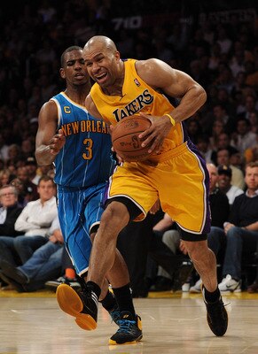 LOS ANGELES, CA - APRIL 26:  Derek Fisher #2 of the Los Angeles Lakers drives on Chris Paul #3 of the New Orleans Hornets in the second quarter in Game Five of the Western Conference Quarterfinals in the 2011 NBA Playoffs on April 26, 2011 at Staples Cent