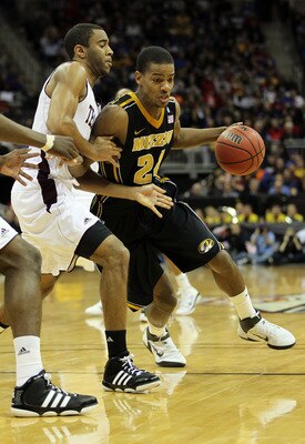 KANSAS CITY, MO - MARCH 10:  Kim English #24 of the Missouri Tigers drives with the ball against the Texas A&M Aggies during their quarterfinal game in the 2011 Phillips 66 Big 12 Men's Basketball Tournament at Sprint Center on March 10, 2011 in Kansas Ci